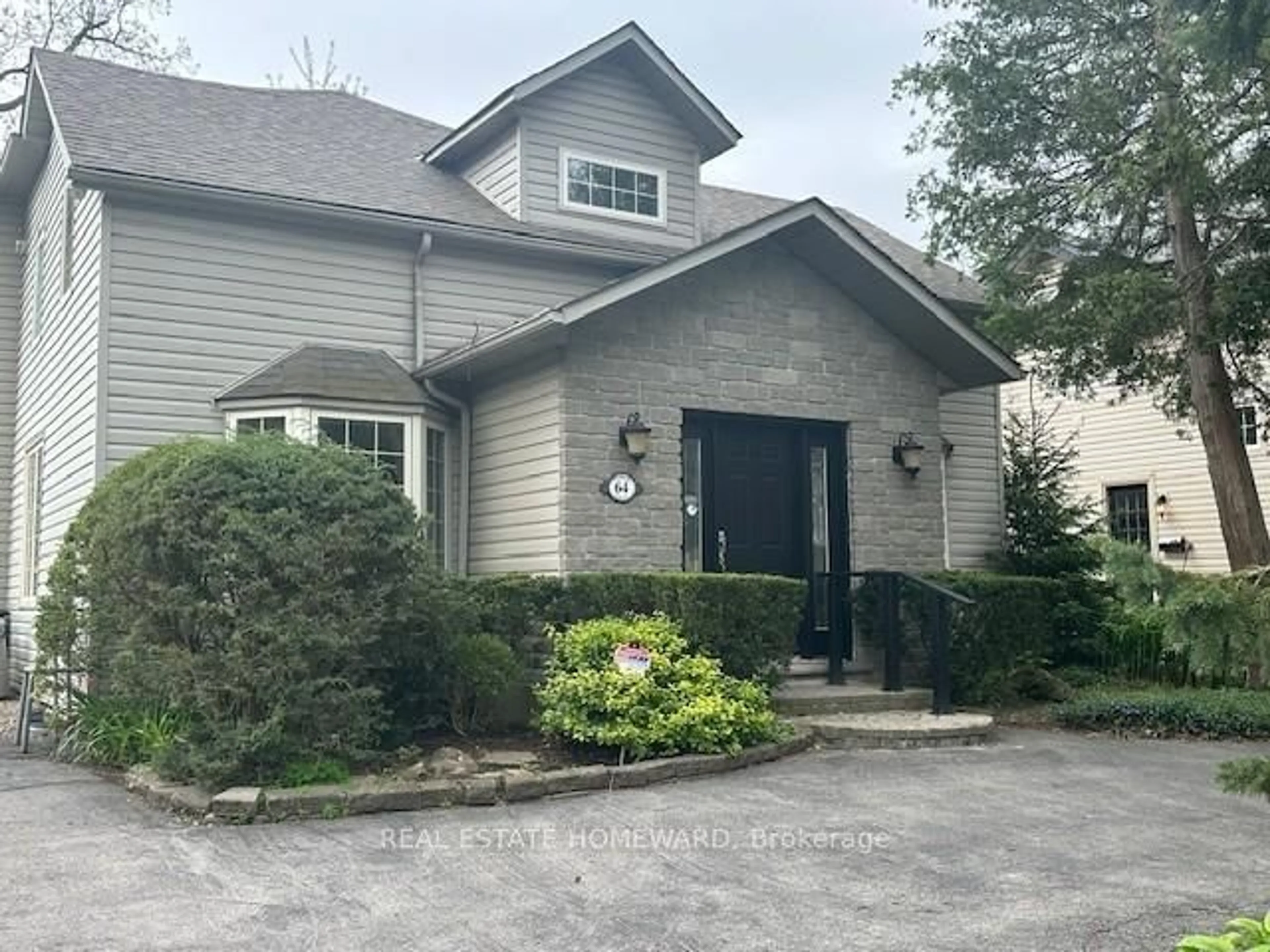Home with vinyl exterior material, street for 64 Academy St, Hamilton Ontario L9G 2Y1