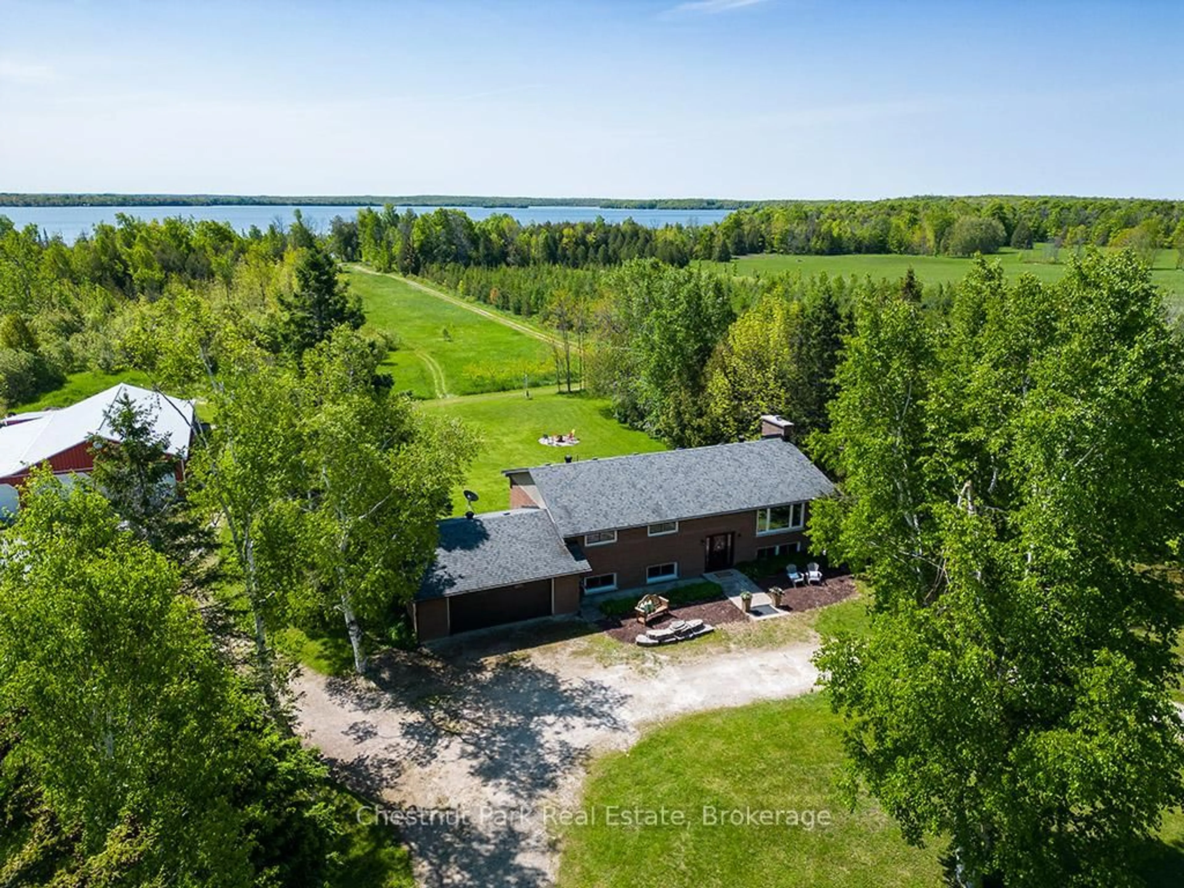 A pic from outside/outdoor area/front of a property/back of a property/a pic from drone, water/lake/river/ocean view for 282 Mar Sdrd, South Bruce Peninsula Ontario N0H 2T0