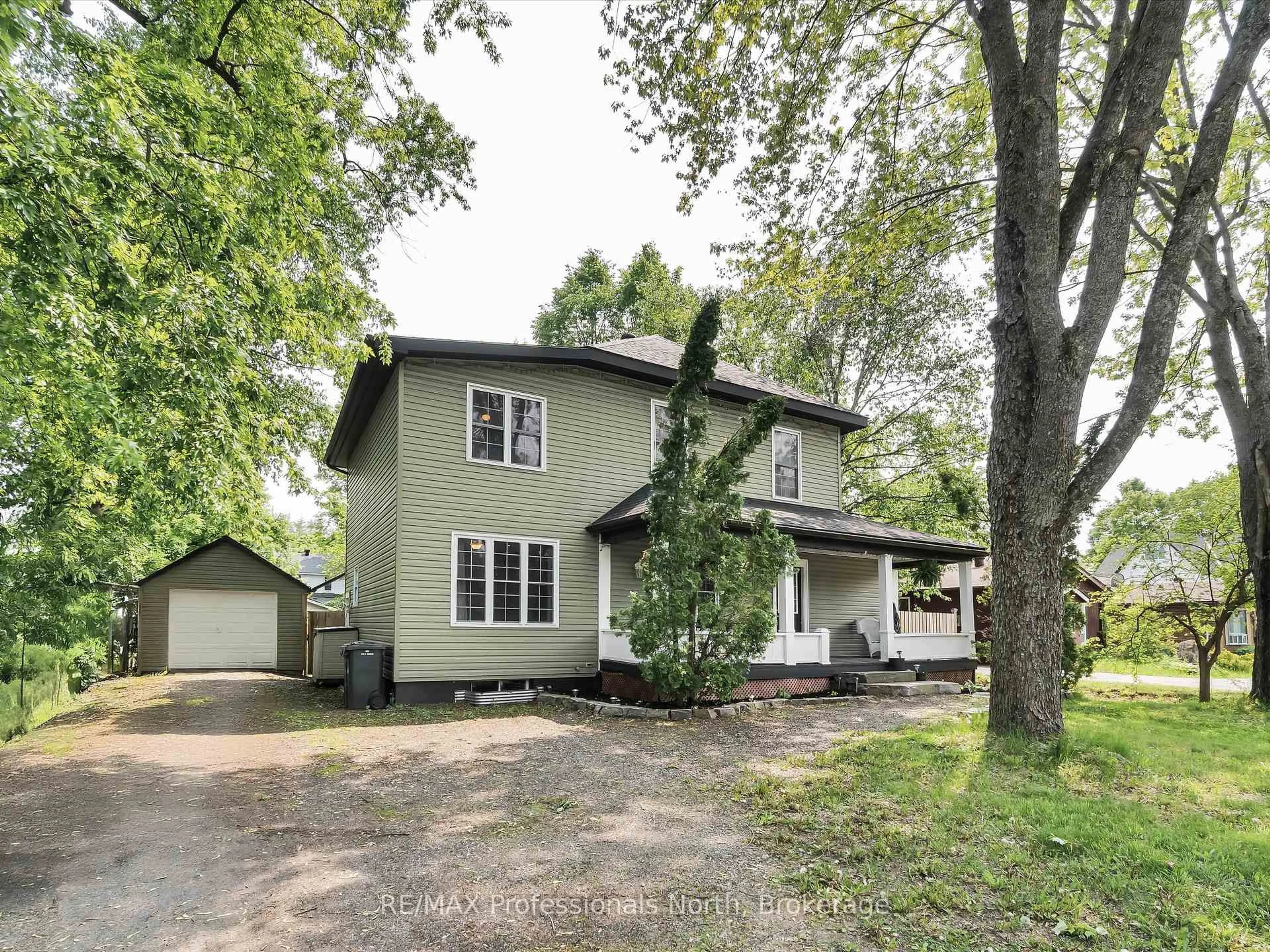 A pic from outside/outdoor area/front of a property/back of a property/a pic from drone, street for 74 Taylor Rd, Bracebridge Ontario P1L 1J2