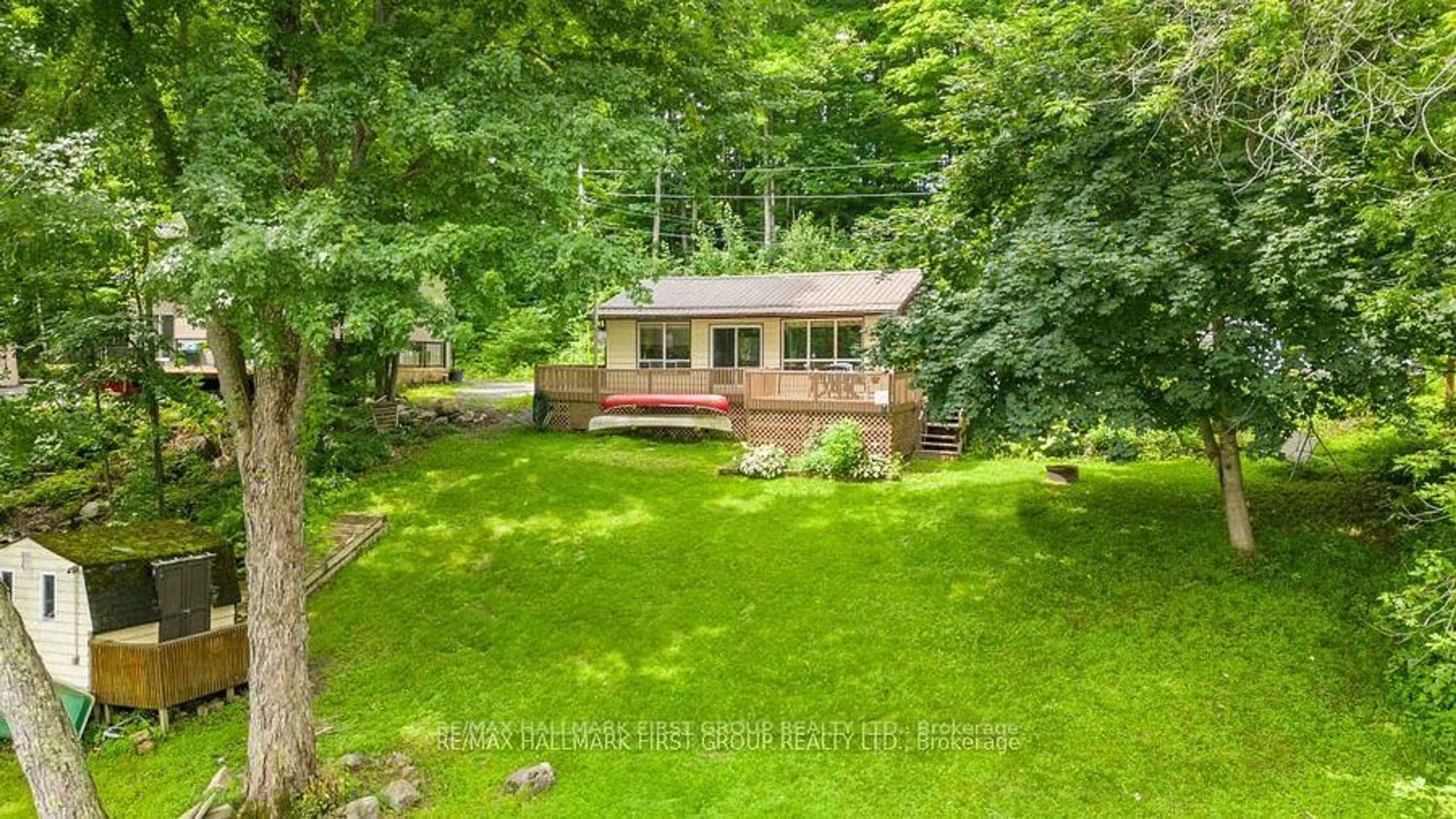 A pic from outside/outdoor area/front of a property/back of a property/a pic from drone, forest/trees view for 198 Hagerman Lane, Belleville Ontario K0K 2Y0