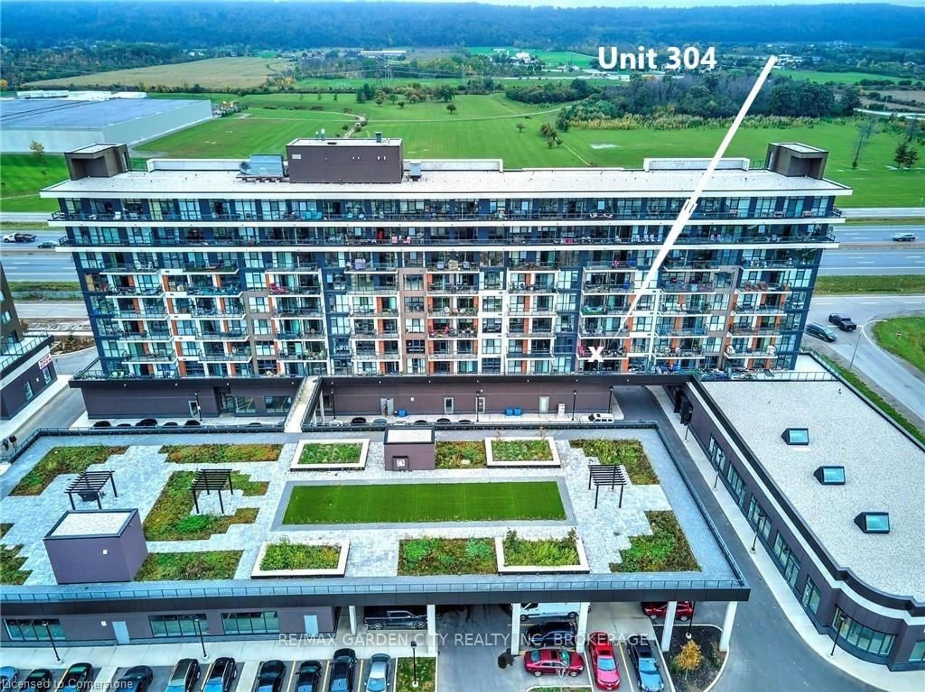 A pic from outside/outdoor area/front of a property/back of a property/a pic from drone, city buildings view from balcony for 560 North Service Rd #304, Grimsby Ontario L3M 4E8