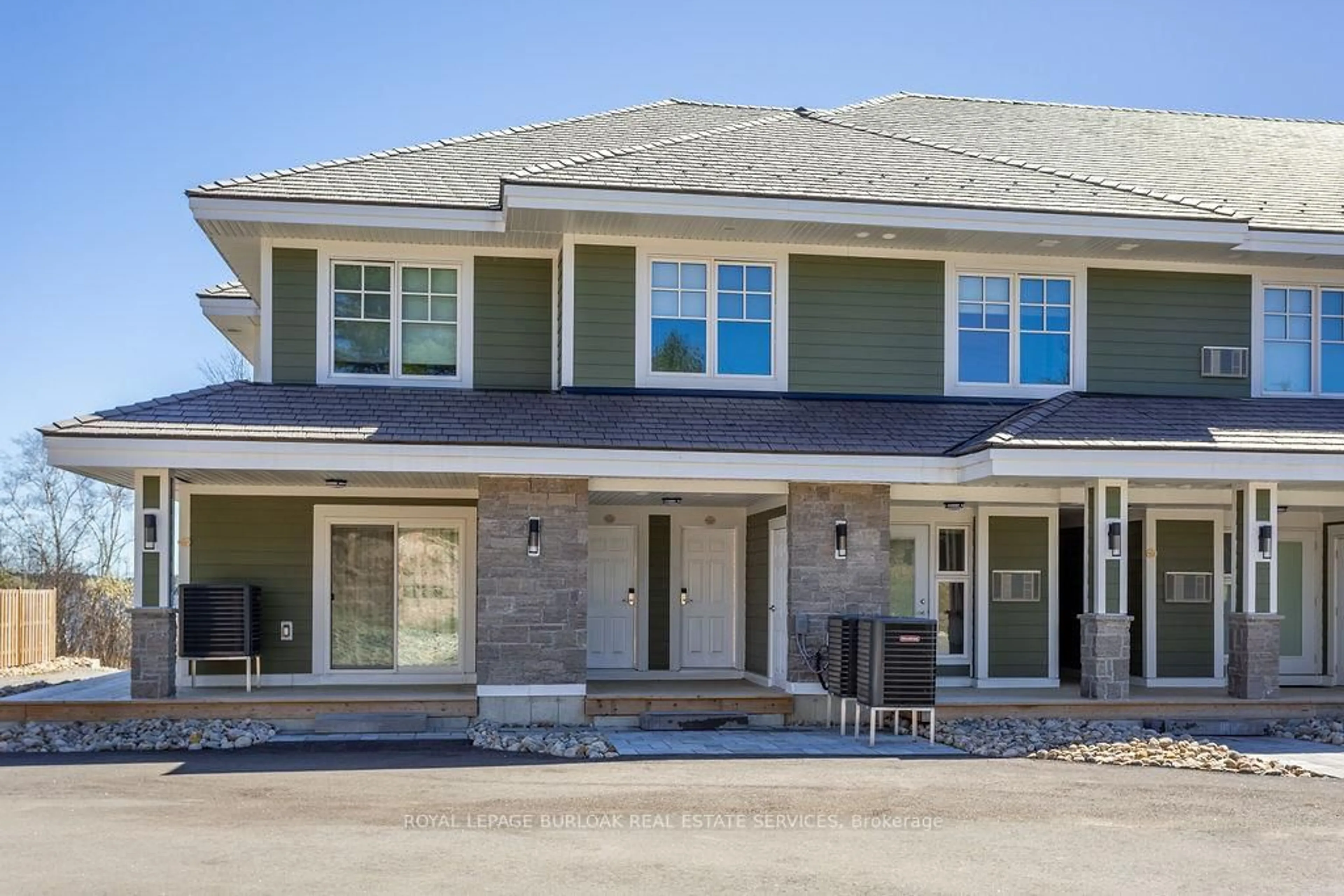 Home with brick exterior material, street for 1869 Muskoka 118 Rd #BTV-105, Muskoka Lakes Ontario P1L 1W8