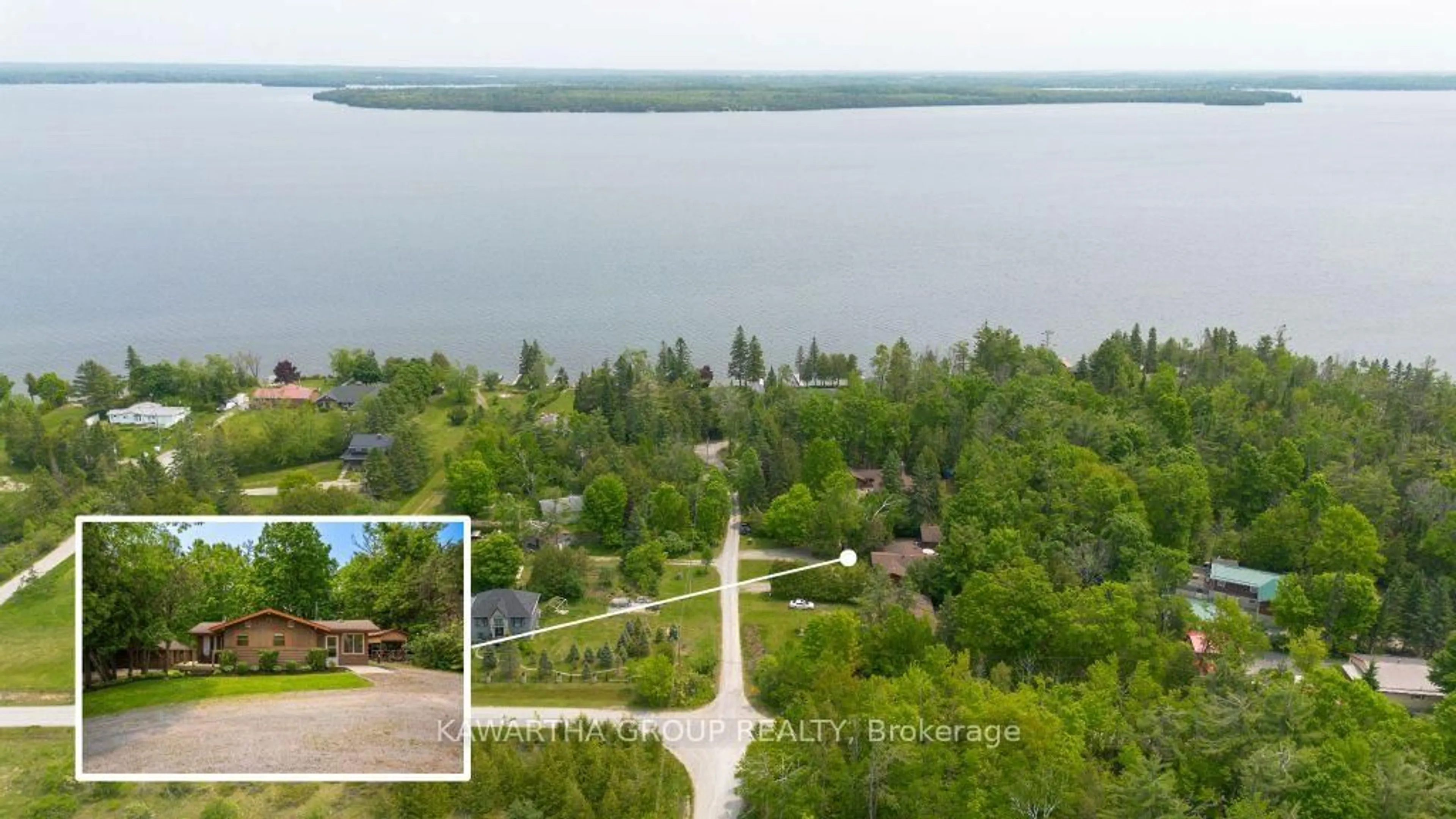 A pic from outside/outdoor area/front of a property/back of a property/a pic from drone, water/lake/river/ocean view for 92 Laidlaw Dr, Kawartha Lakes Ontario K0M 2B0