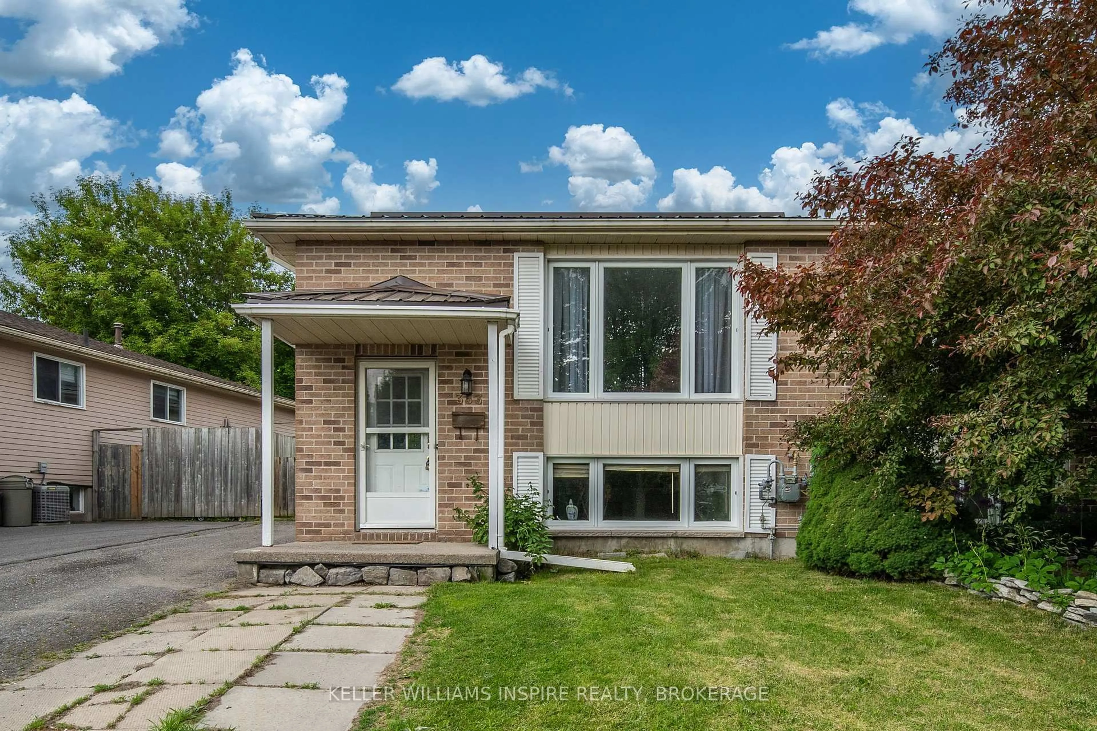 Home with brick exterior material, street for 353 Kingsdale Ave, Kingston Ontario K7M 7Z1