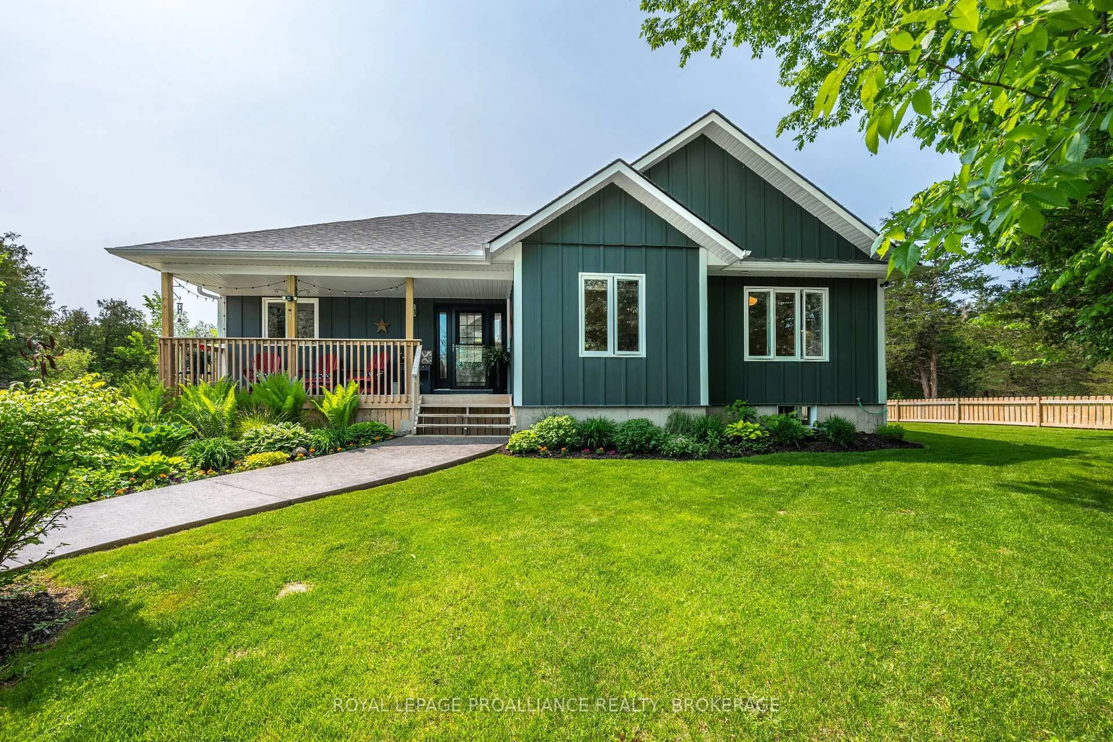 Home with vinyl exterior material, street for 340 Cutler Rd, Yarker Ontario K0K 3N0