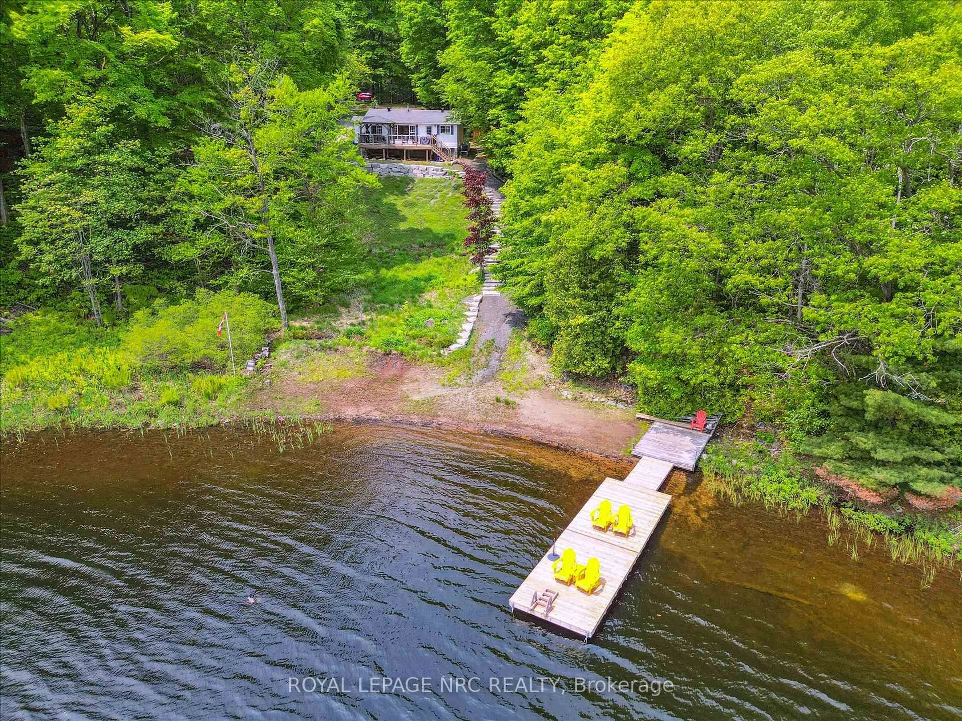 A pic from outside/outdoor area/front of a property/back of a property/a pic from drone, water/lake/river/ocean view for 283 Salmon Lake Rd, Seguin Ontario P2A 2W8
