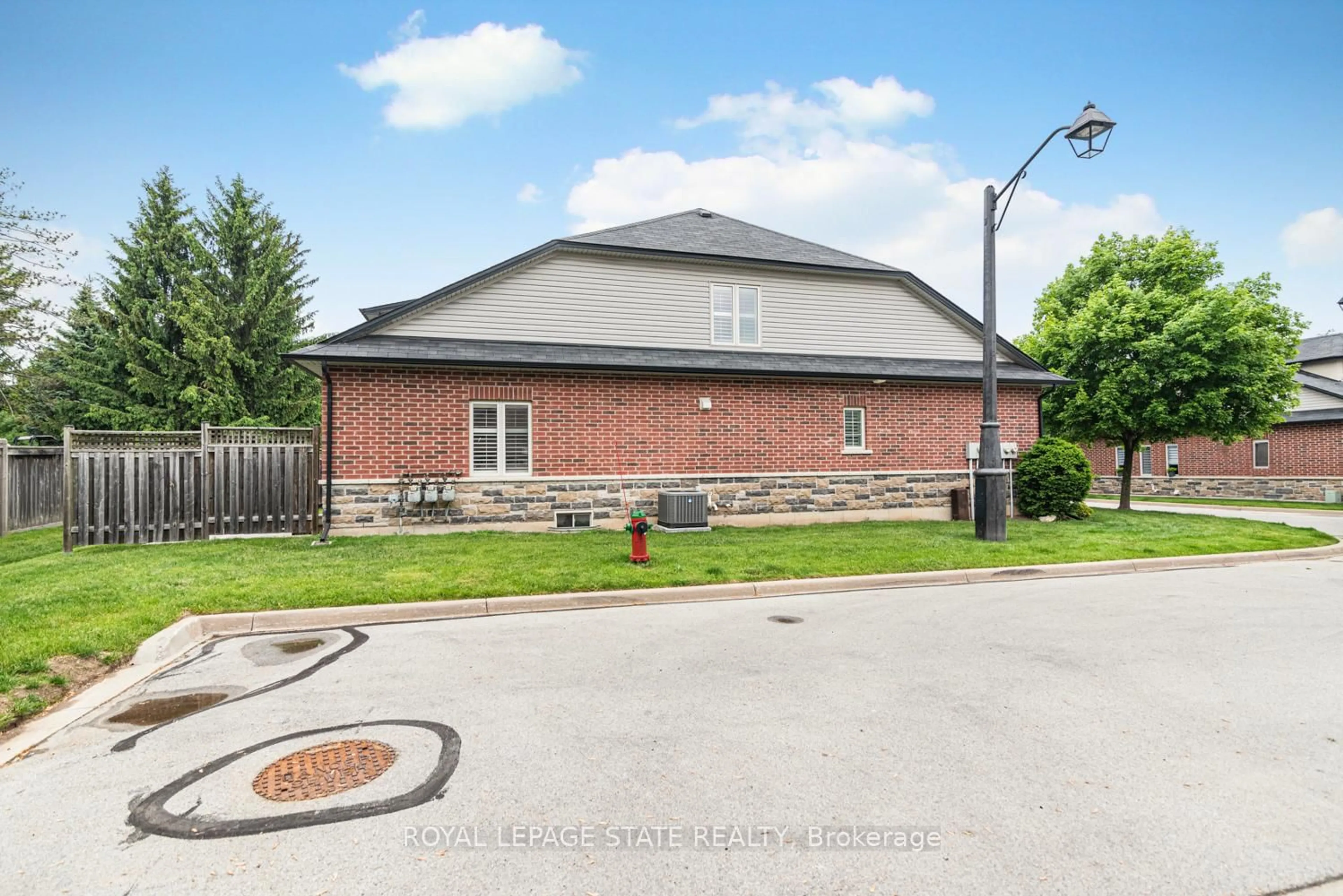 Home with brick exterior material, street for 114 Toulon Ave, Hamilton Ontario L9K 1L5