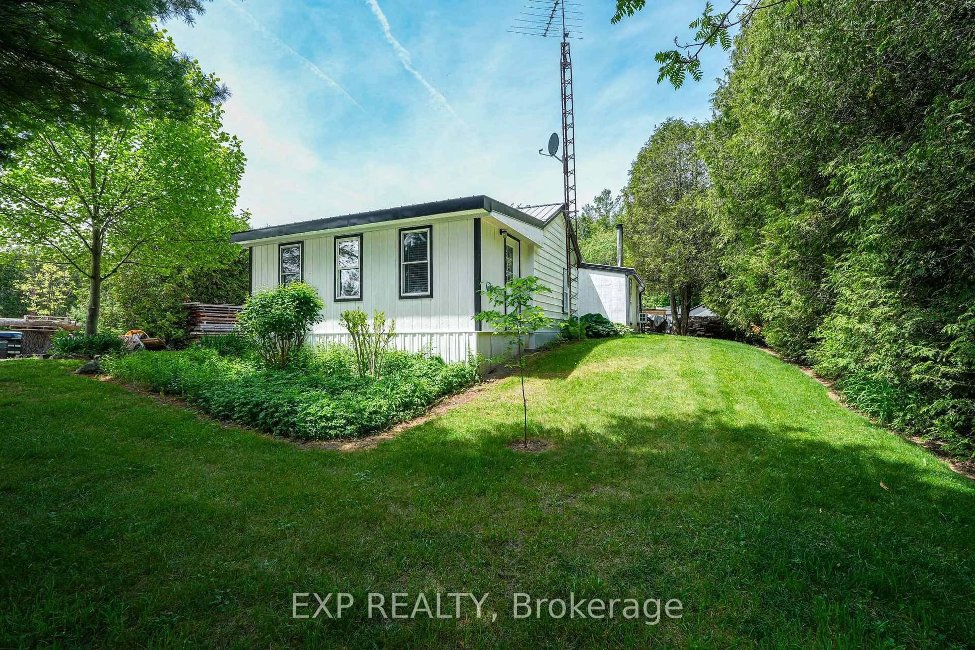 A pic from outside/outdoor area/front of a property/back of a property/a pic from drone, unknown for 32207 Sylvan Rd, North Middlesex Ontario N0M 2K0