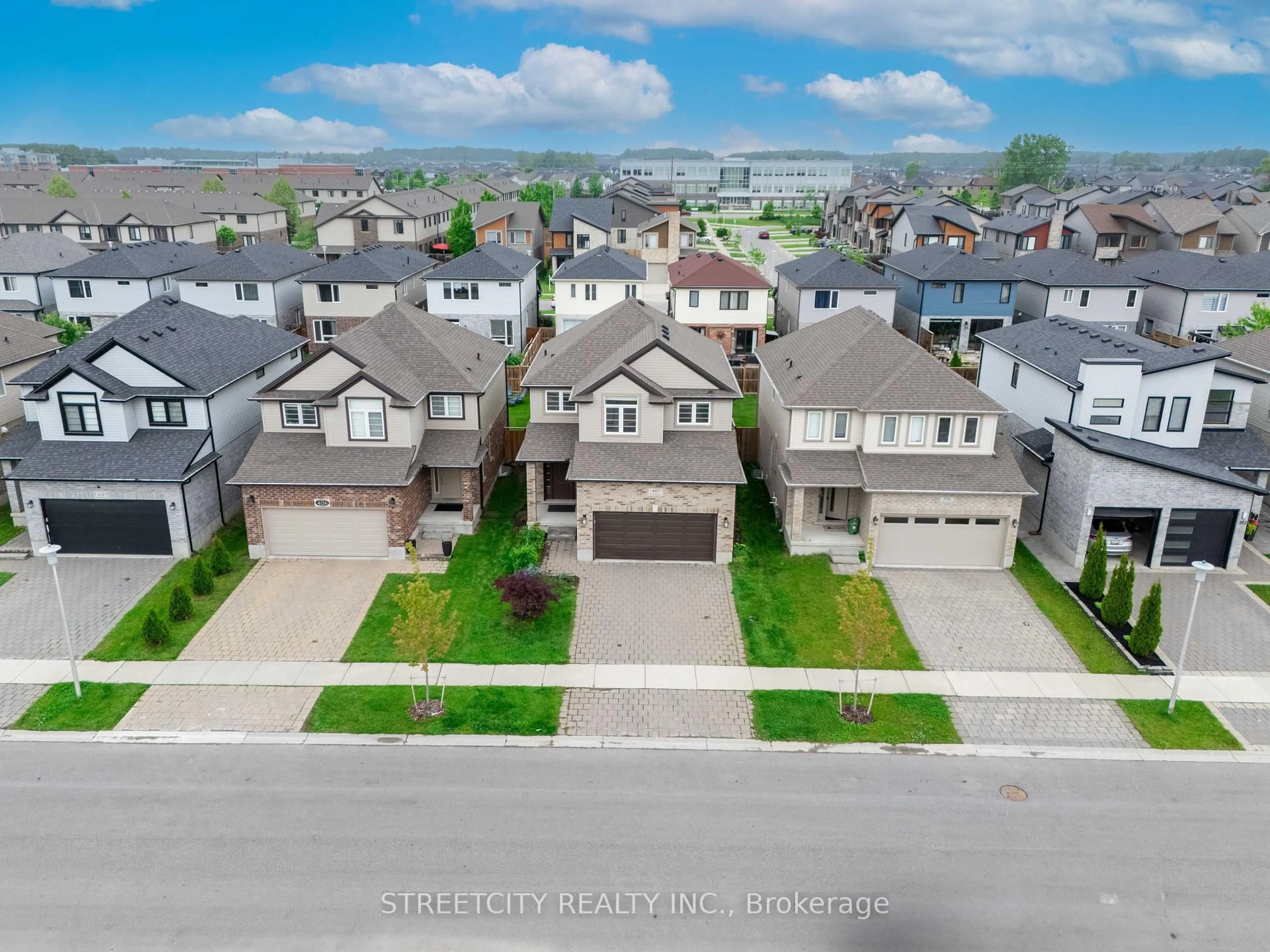 A pic from outside/outdoor area/front of a property/back of a property/a pic from drone, street for 402 TANSBURY St, London North Ontario N6G 0R6