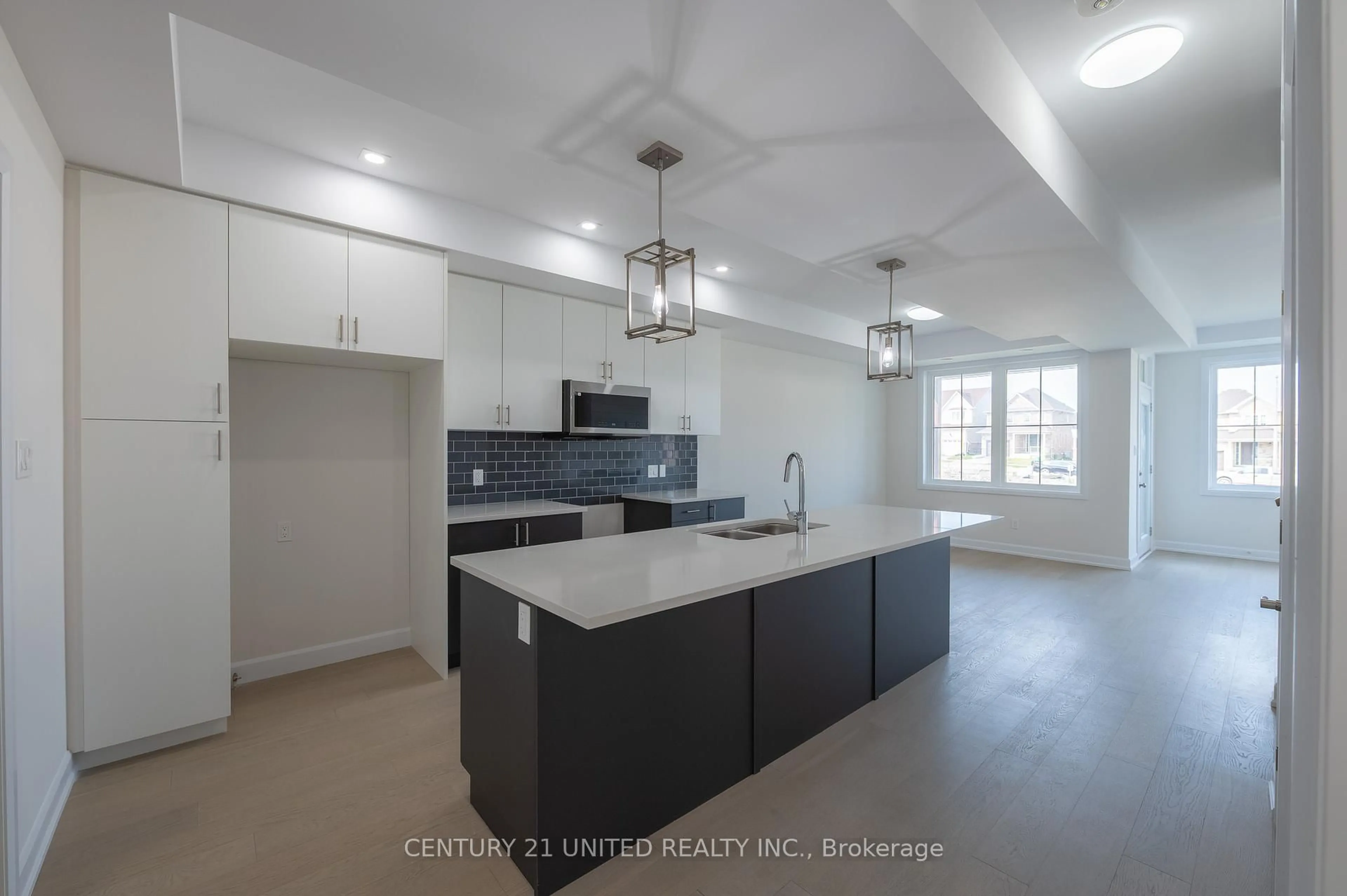 Open concept kitchen, ceramic/tile floor for 309 Mullighan Gdns, Peterborough North Ontario K9K 0G3