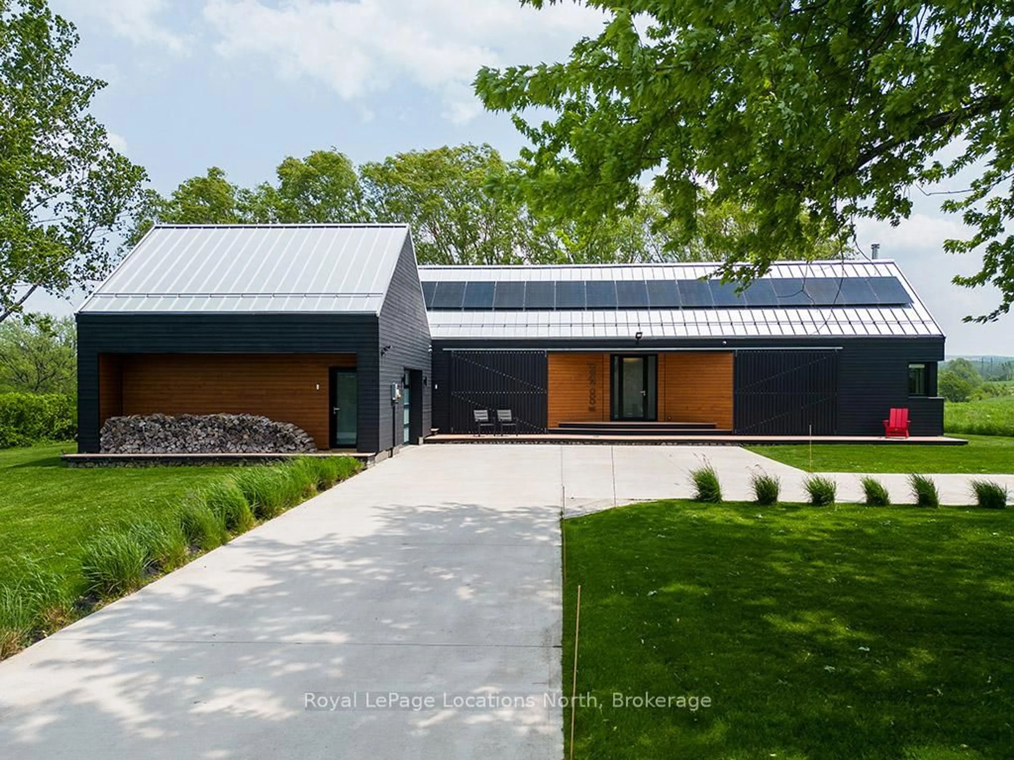 Home with brick exterior material, street for 416219 10th Line, Blue Mountains Ontario N0H 1J0