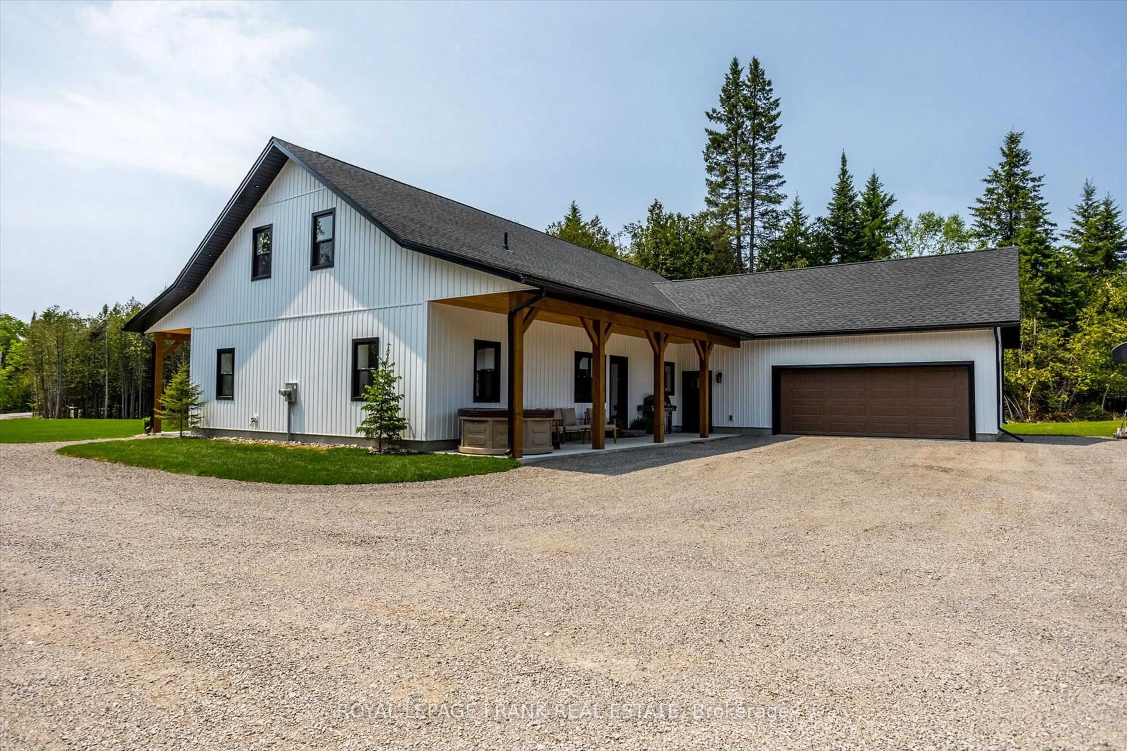 A pic from outside/outdoor area/front of a property/back of a property/a pic from drone, street for 652 County Road 49, Trent Lakes Ontario K0M 1A0
