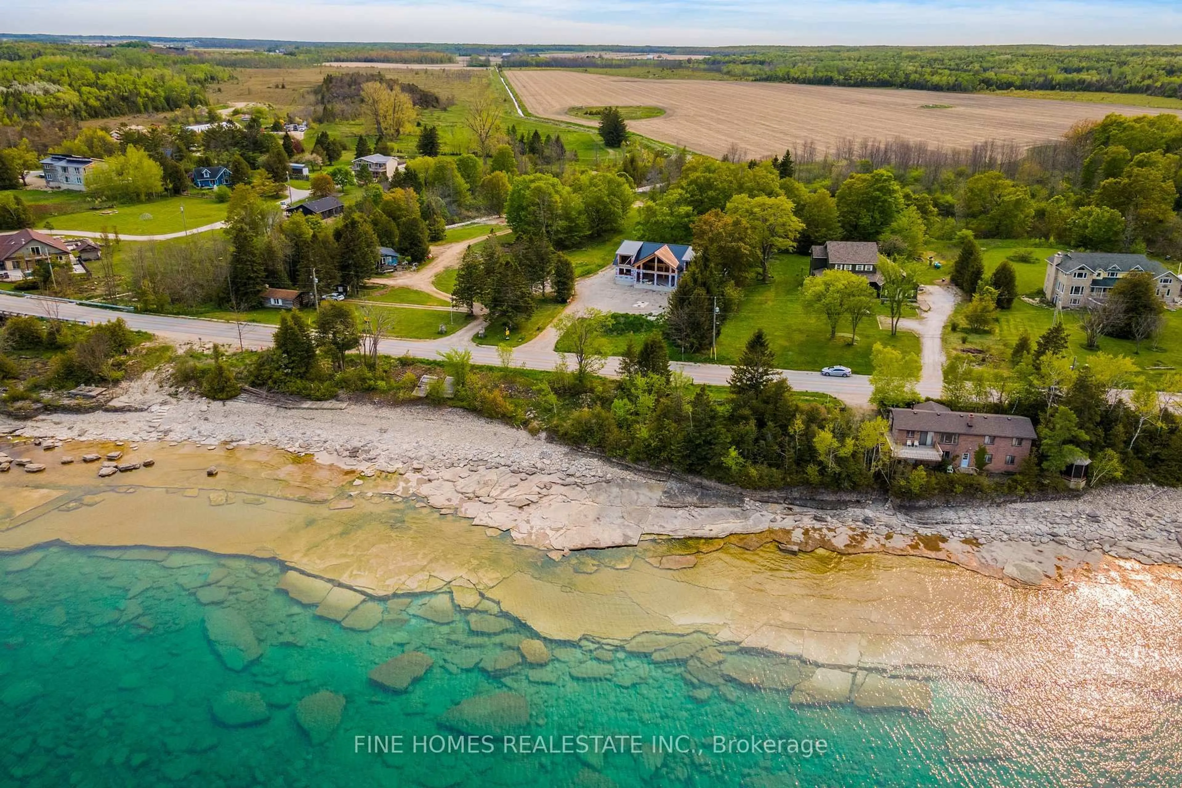 A pic from outside/outdoor area/front of a property/back of a property/a pic from drone, water/lake/river/ocean view for 243 Isthmus Bay Rd, Northern Bruce Peninsula Ontario N0H 1W0
