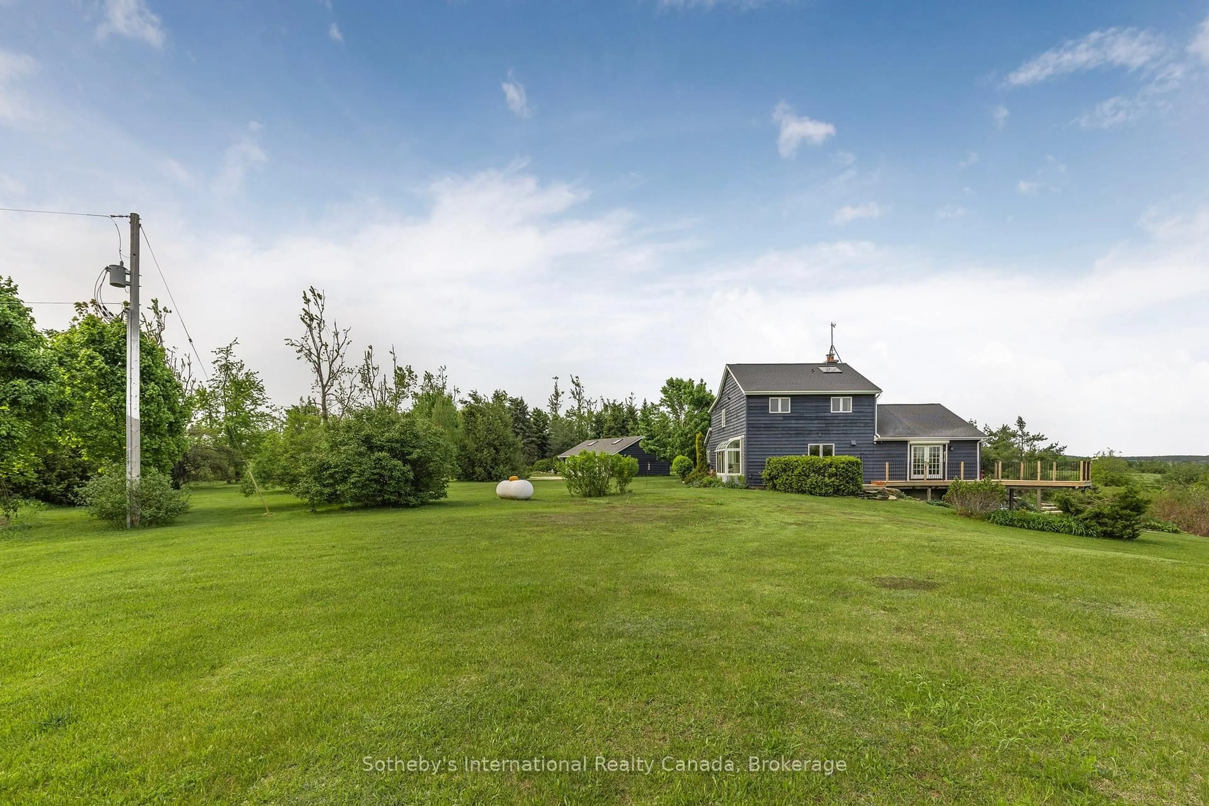 A pic from outside/outdoor area/front of a property/back of a property/a pic from drone, water/lake/river/ocean view for 758693 2nd Line, Mulmur Ontario L9V 0H1