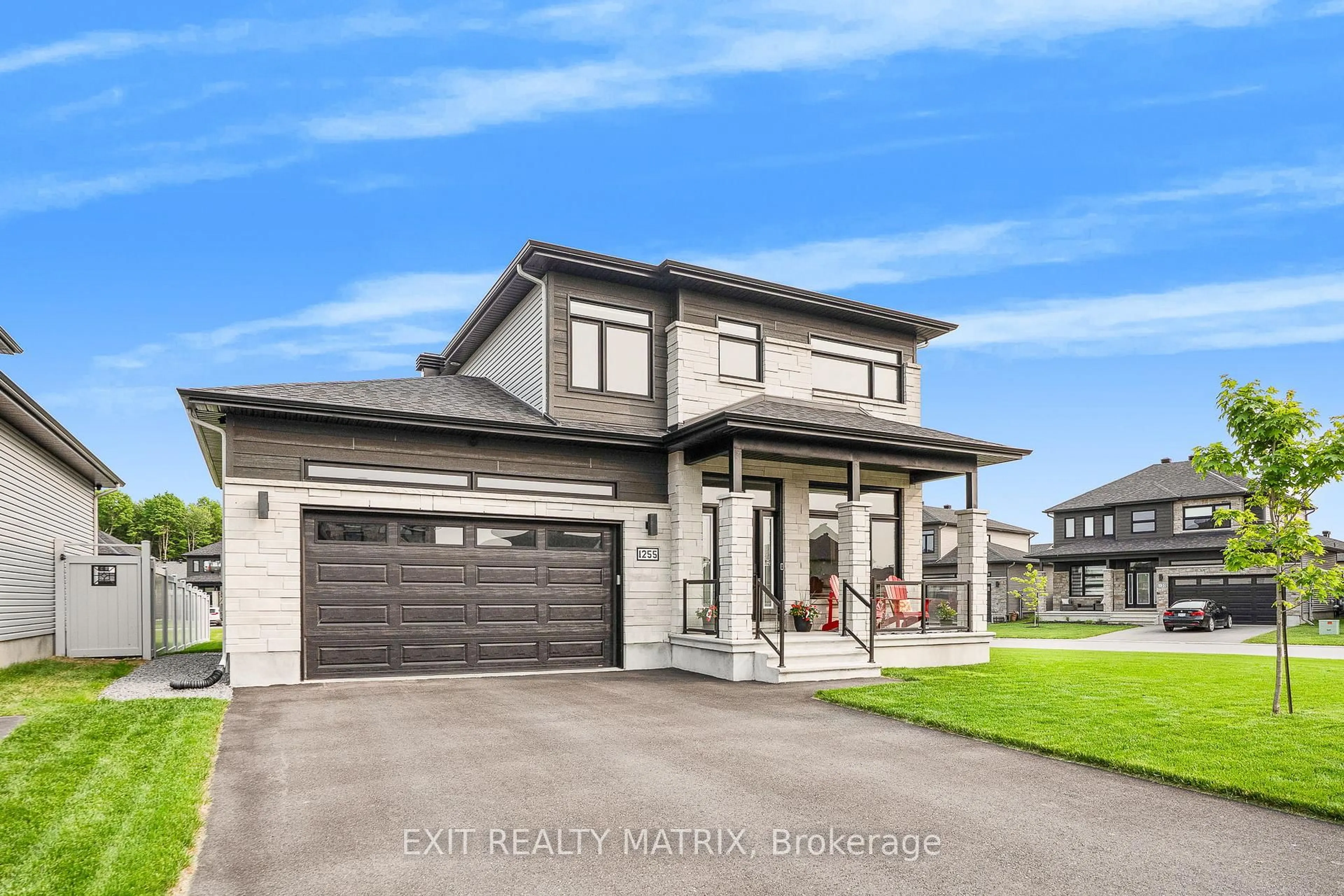 Home with vinyl exterior material, street for 1255 Avignon St, Russell Ontario K0A 1W0