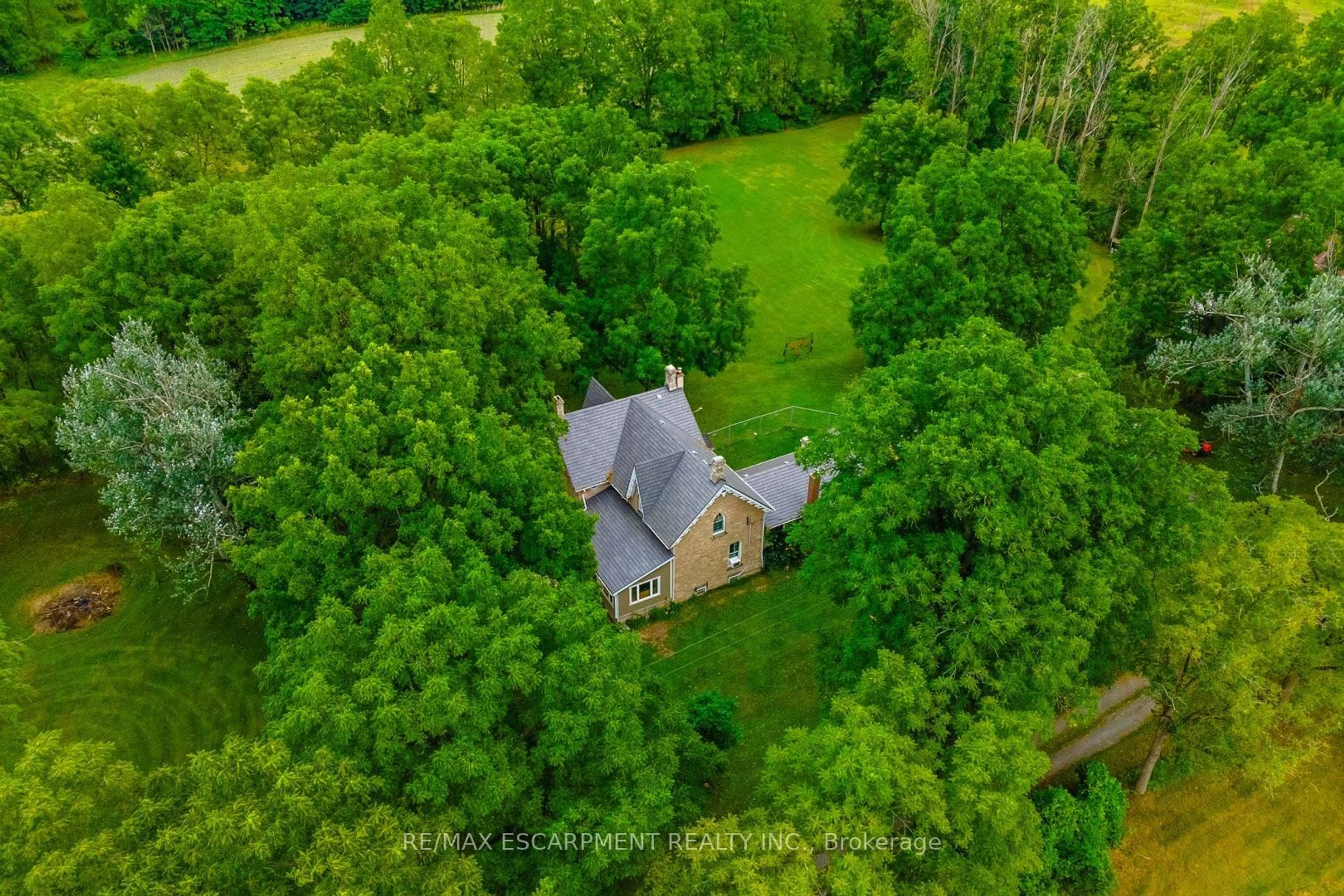 A pic from outside/outdoor area/front of a property/back of a property/a pic from drone, forest/trees view for 1172 8th Concession Rd, Hamilton Ontario N0B 2J0