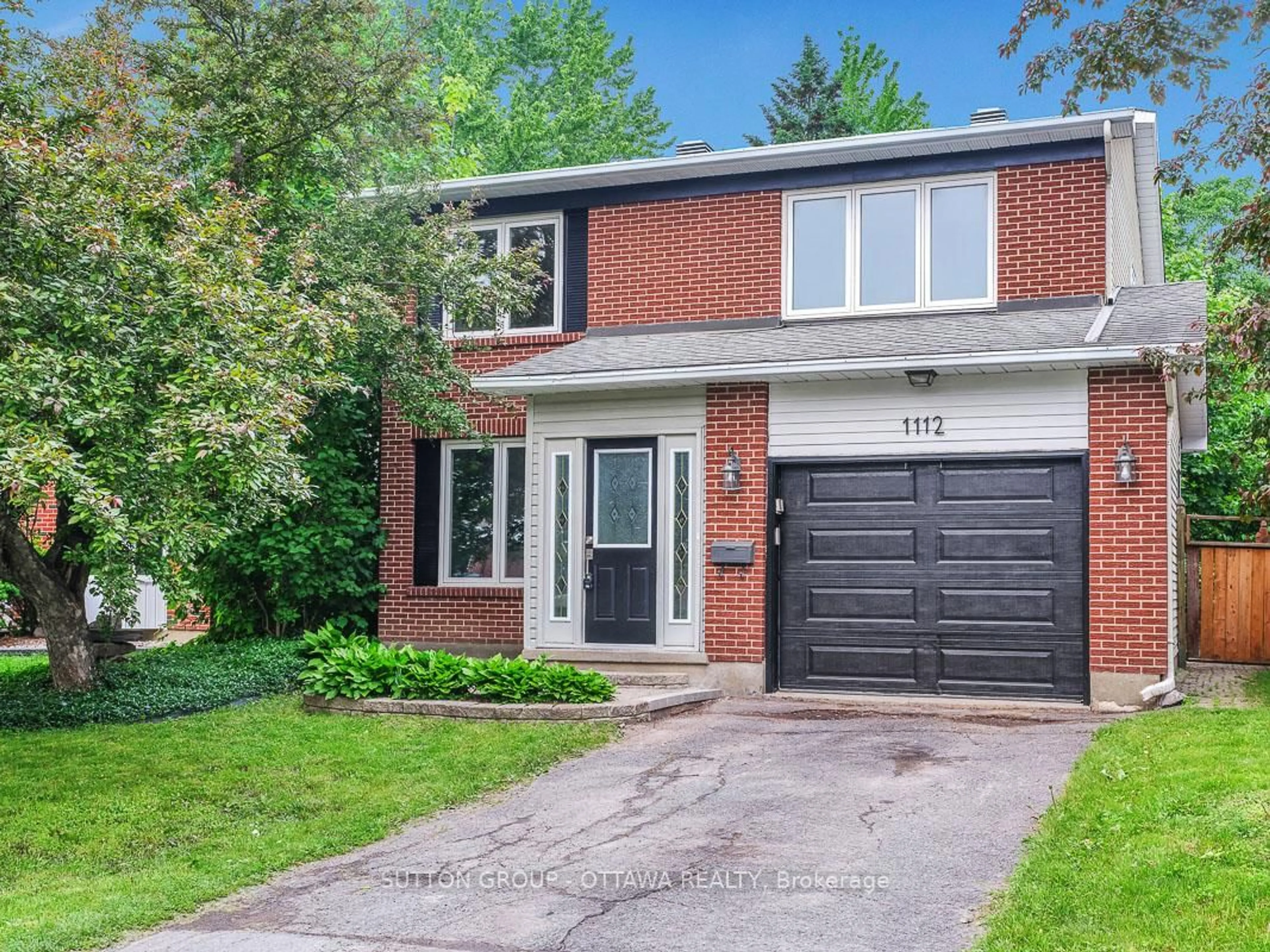 Home with brick exterior material, street for 1112 St. Germain Cres, Ottawa Ontario K1C 2L8