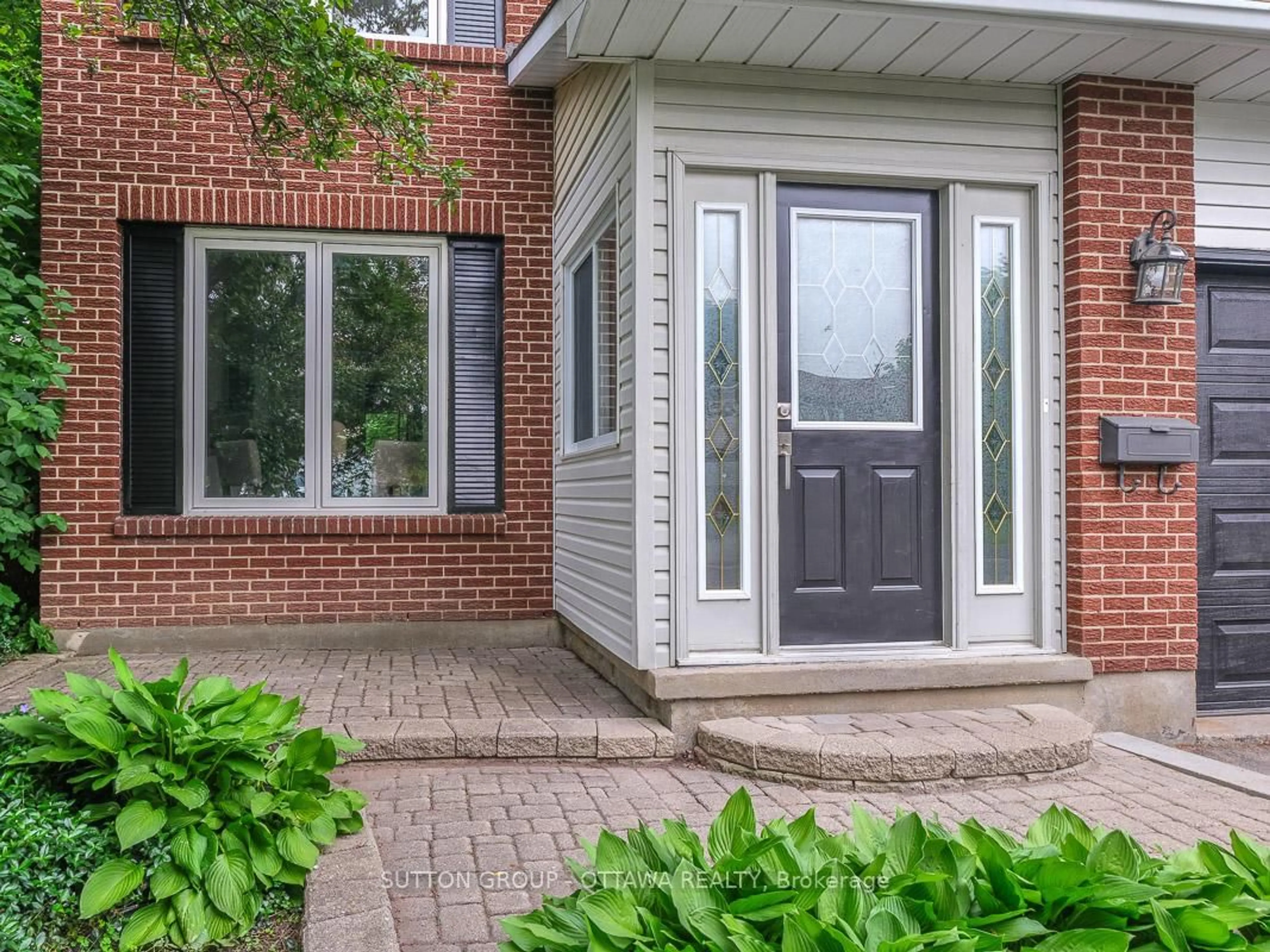 Home with brick exterior material, street for 1112 St. Germain Cres, Ottawa Ontario K1C 2L8