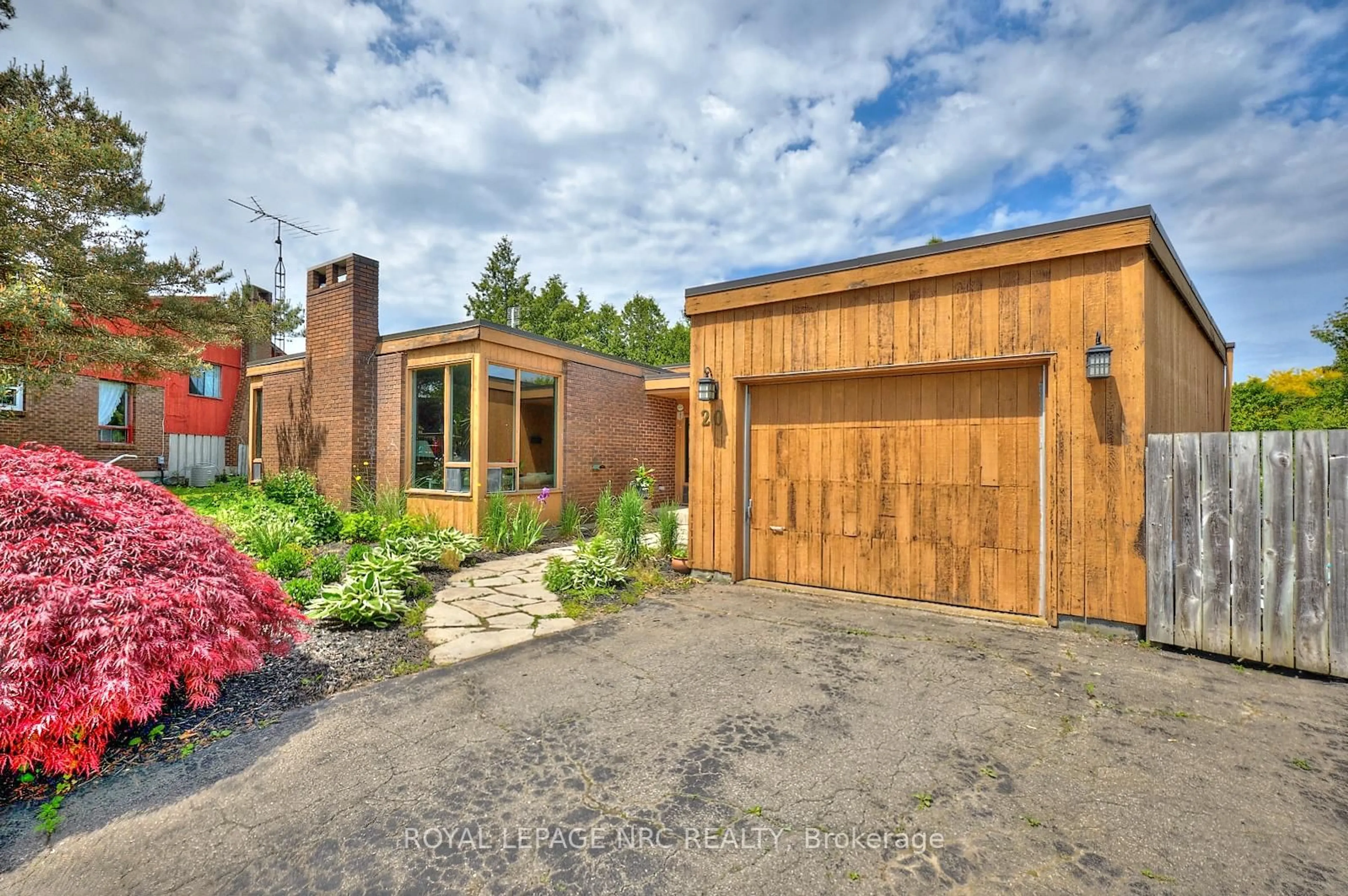 Home with brick exterior material, street for 20 The Cedars, St. Catharines Ontario L2M 6M8