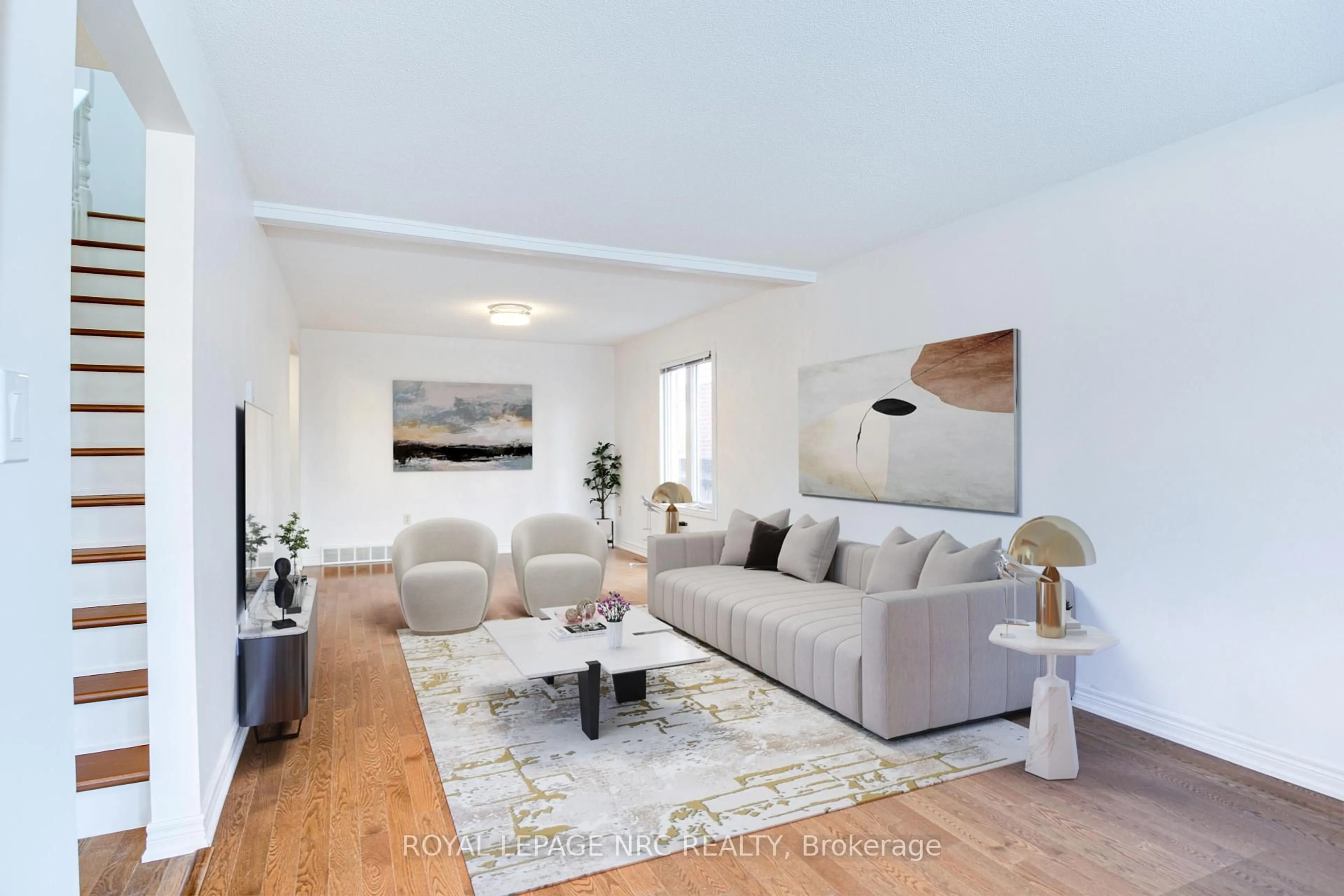Living room with furniture, wood/laminate floor for 14 Bascary Cres, St. Catharines Ontario L2S 3M7