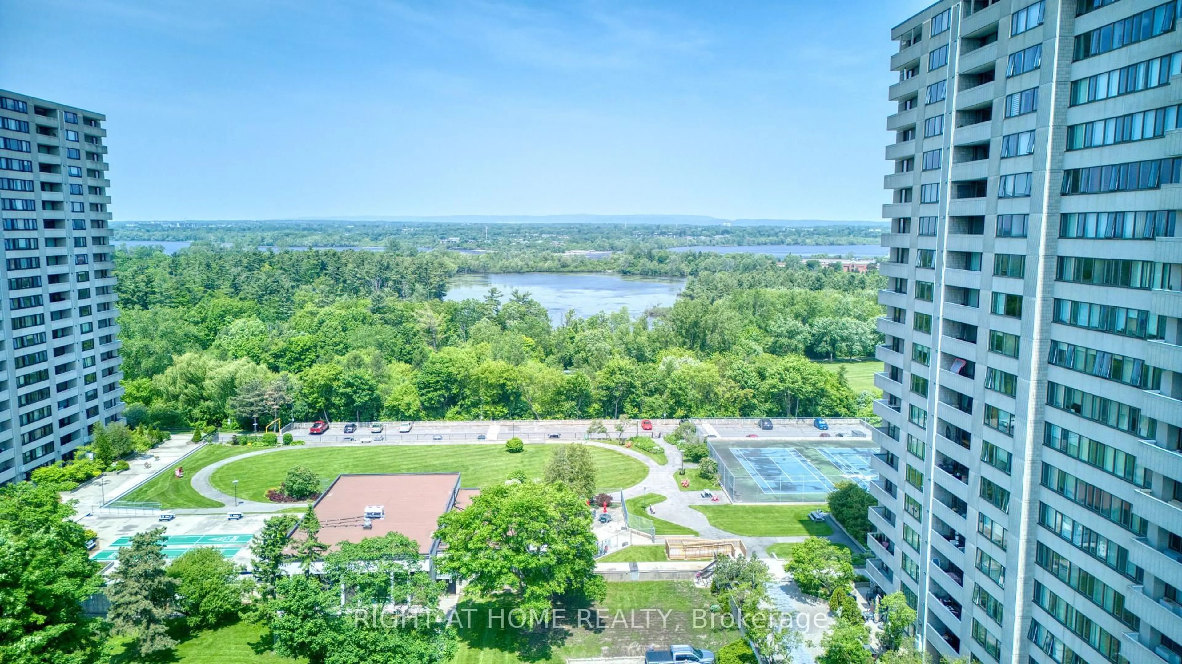 A pic from outside/outdoor area/front of a property/back of a property/a pic from drone, water/lake/river/ocean view for 2625 Regina St #1401, Ottawa Ontario K2B 5W8