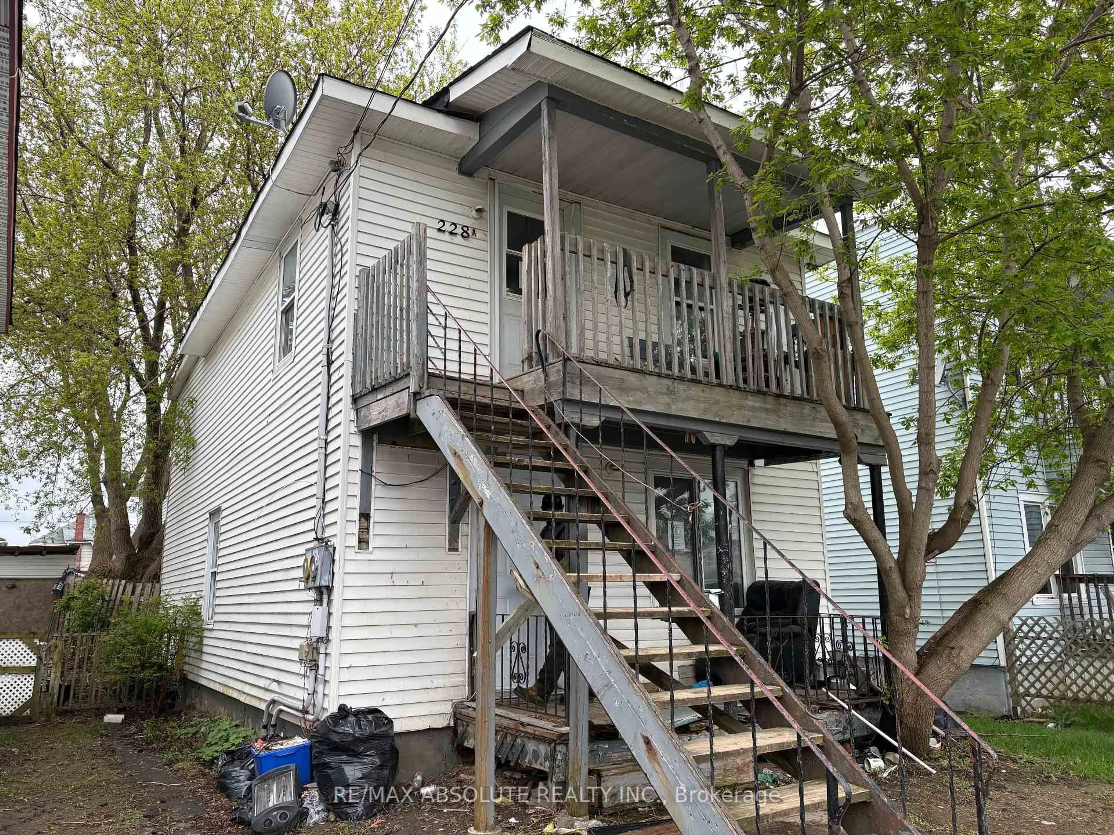Home with vinyl exterior material, street for 228-228A Guy St, Cornwall Ontario K6H 4T9