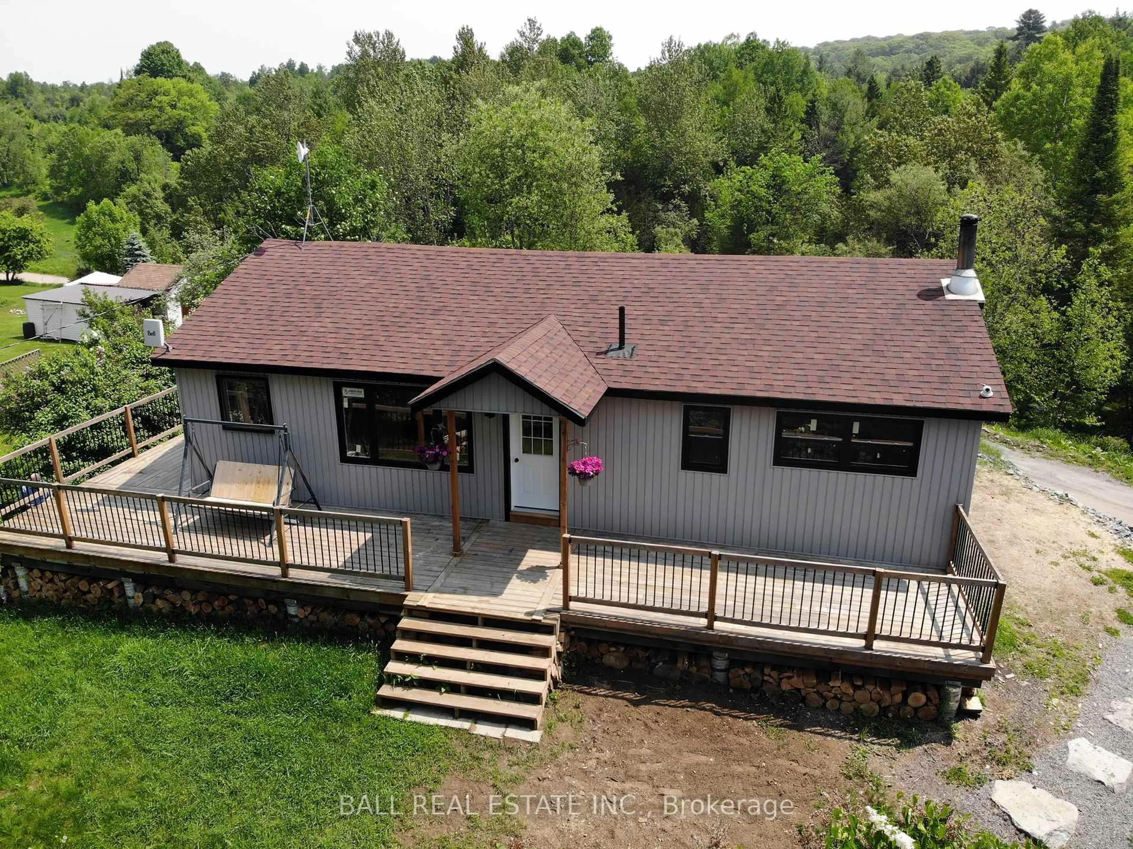 A pic from outside/outdoor area/front of a property/back of a property/a pic from drone, unknown for 99 Moore Lane, Bancroft Ontario K0L 1C0