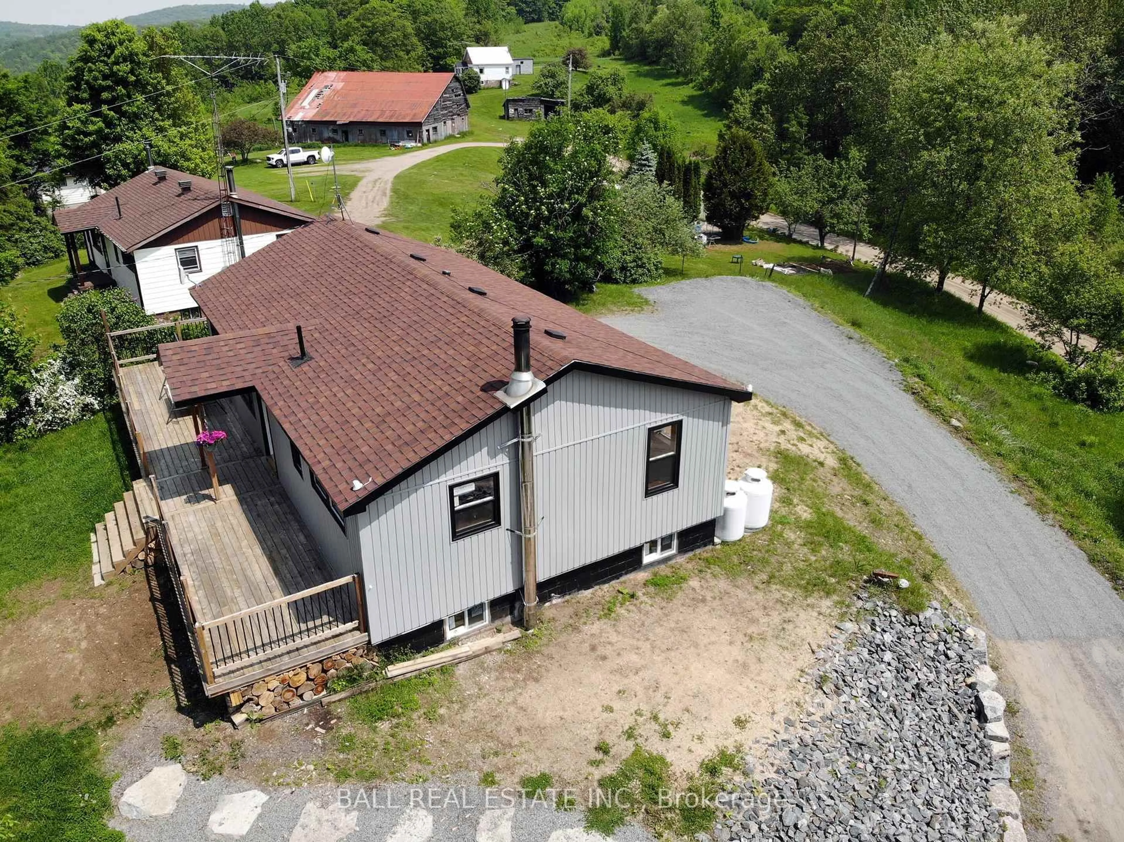 A pic from outside/outdoor area/front of a property/back of a property/a pic from drone, building for 99 Moore Lane, Bancroft Ontario K0L 1C0
