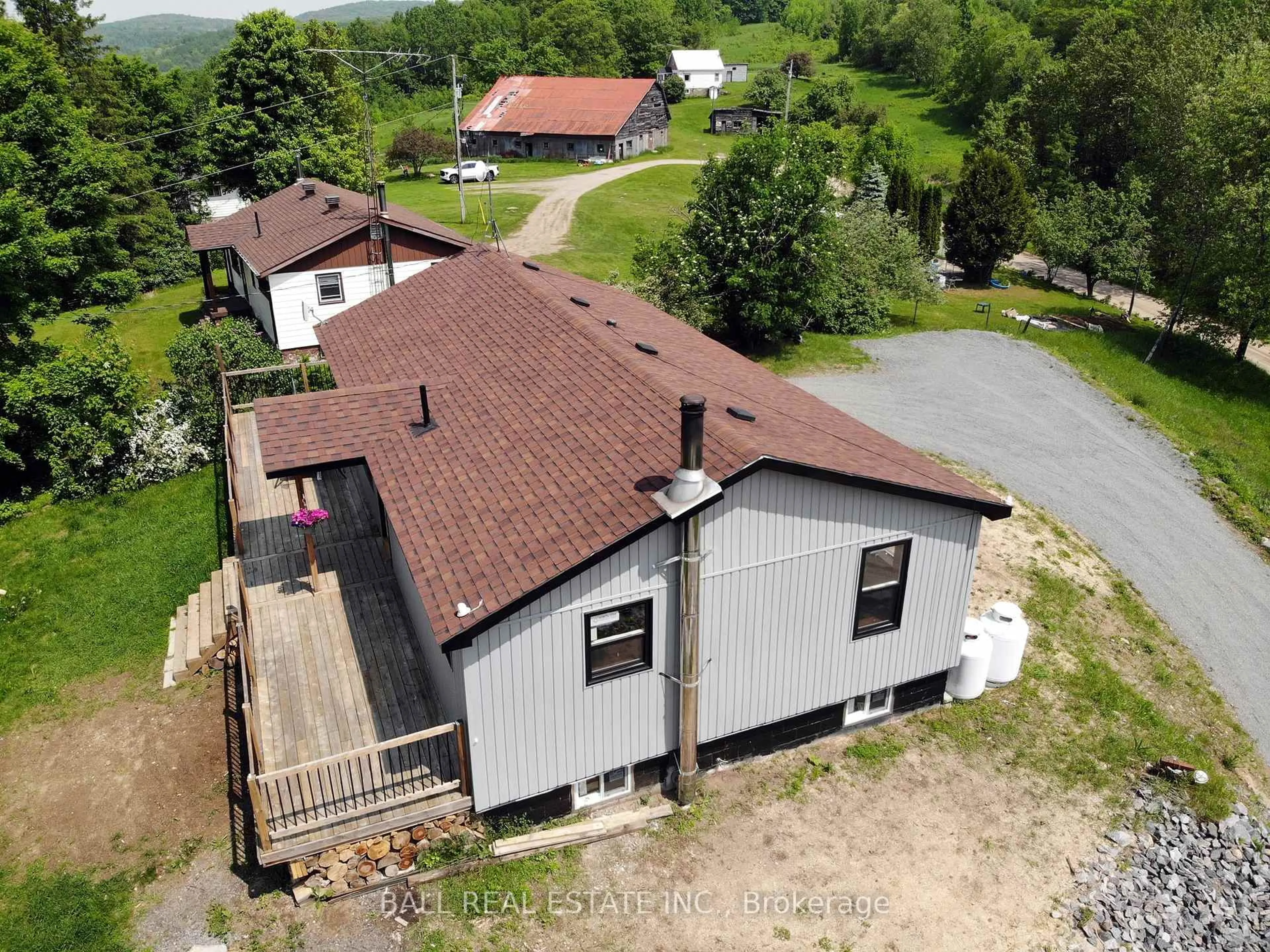 A pic from outside/outdoor area/front of a property/back of a property/a pic from drone, building for 99 Moore Lane, Bancroft Ontario K0L 1C0