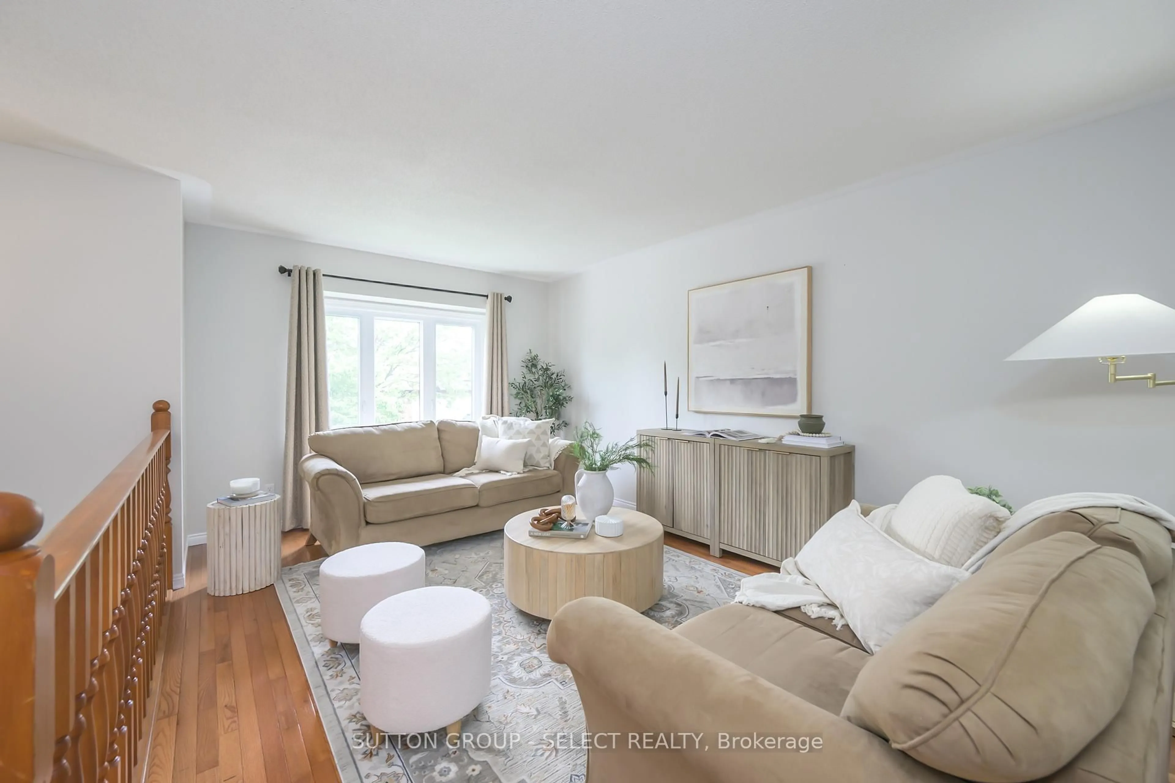 Living room with furniture, wood/laminate floor for 108 Golfdale Cres, London South Ontario N6C 5P5