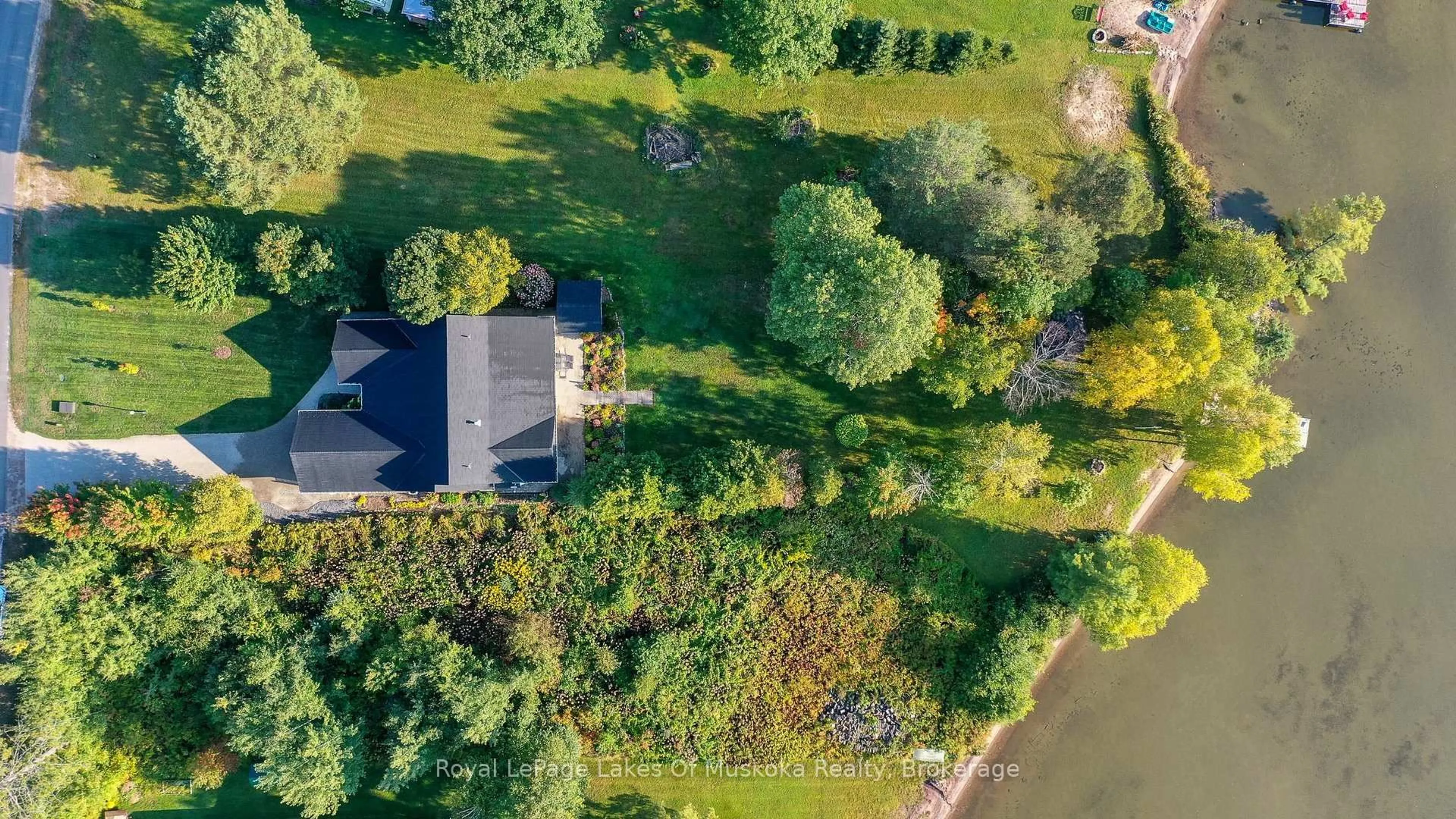 A pic from outside/outdoor area/front of a property/back of a property/a pic from drone, water/lake/river/ocean view for 7 Lake Bernard Dr, Sundridge Ontario P0A 1Z0