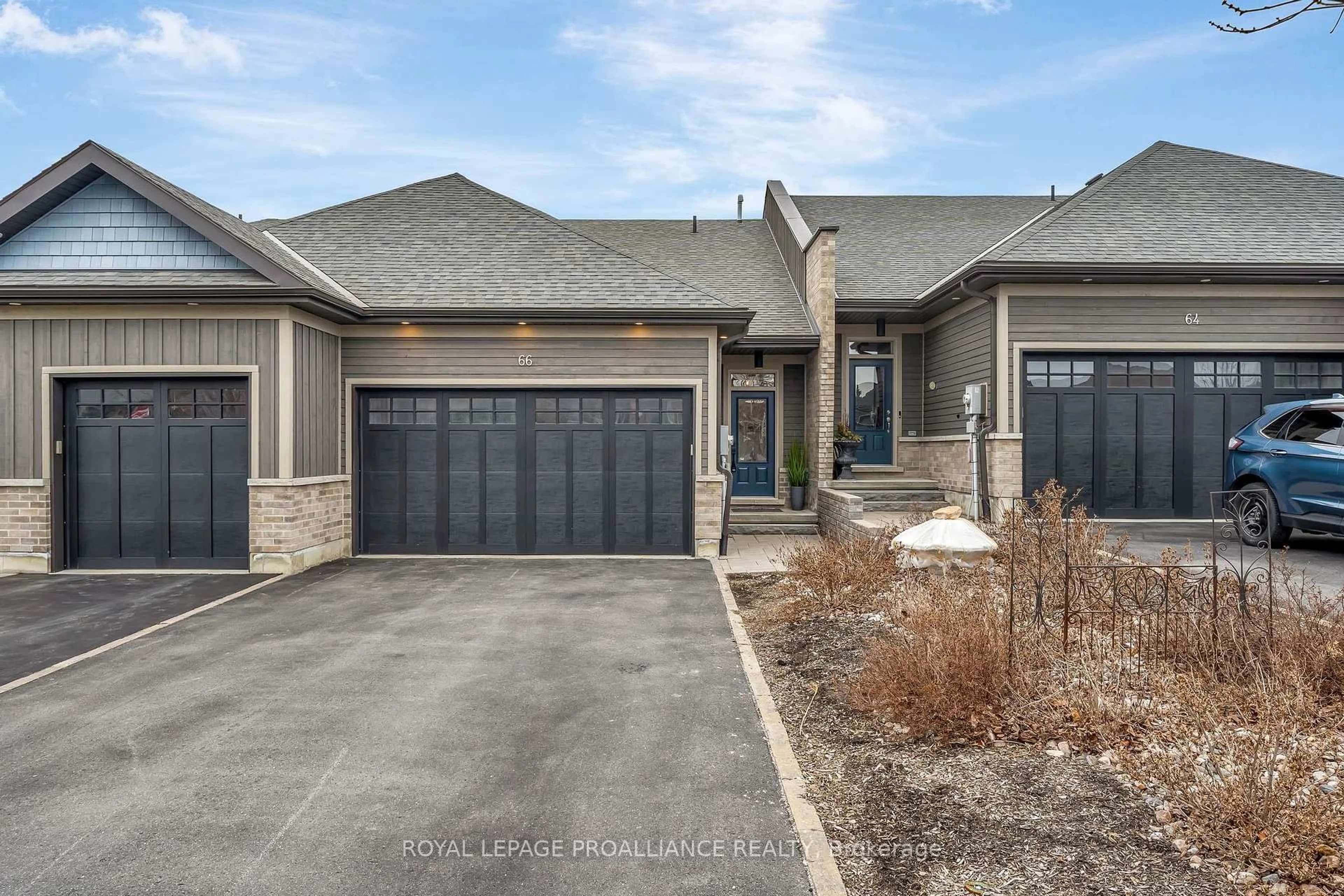 Home with brick exterior material, street for 66 Pineridge Dr, Prince Edward County Ontario K0K 2T0