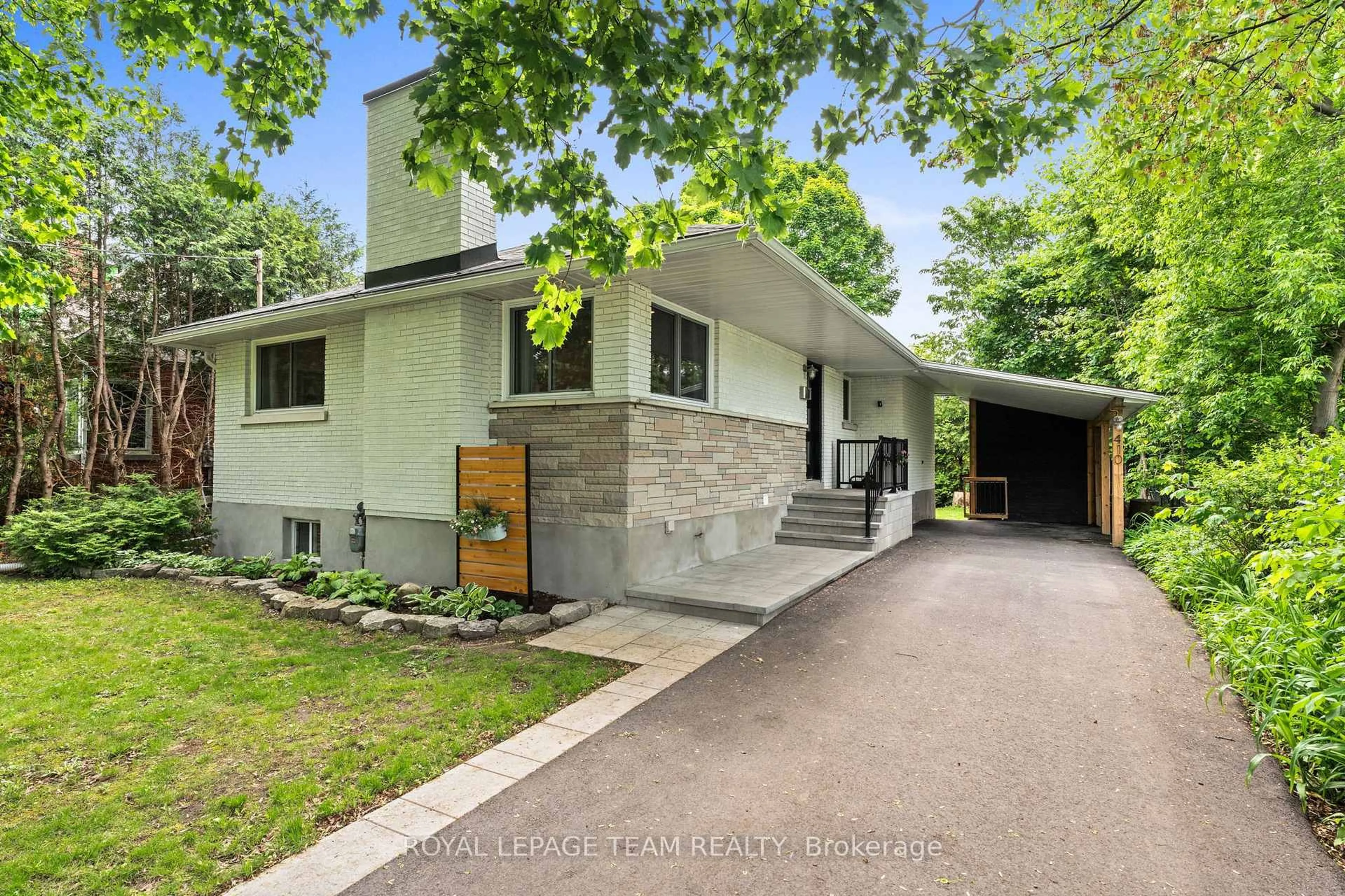 Home with brick exterior material, street for 410 Hartleigh Ave, Ottawa Ontario K2B 5J4