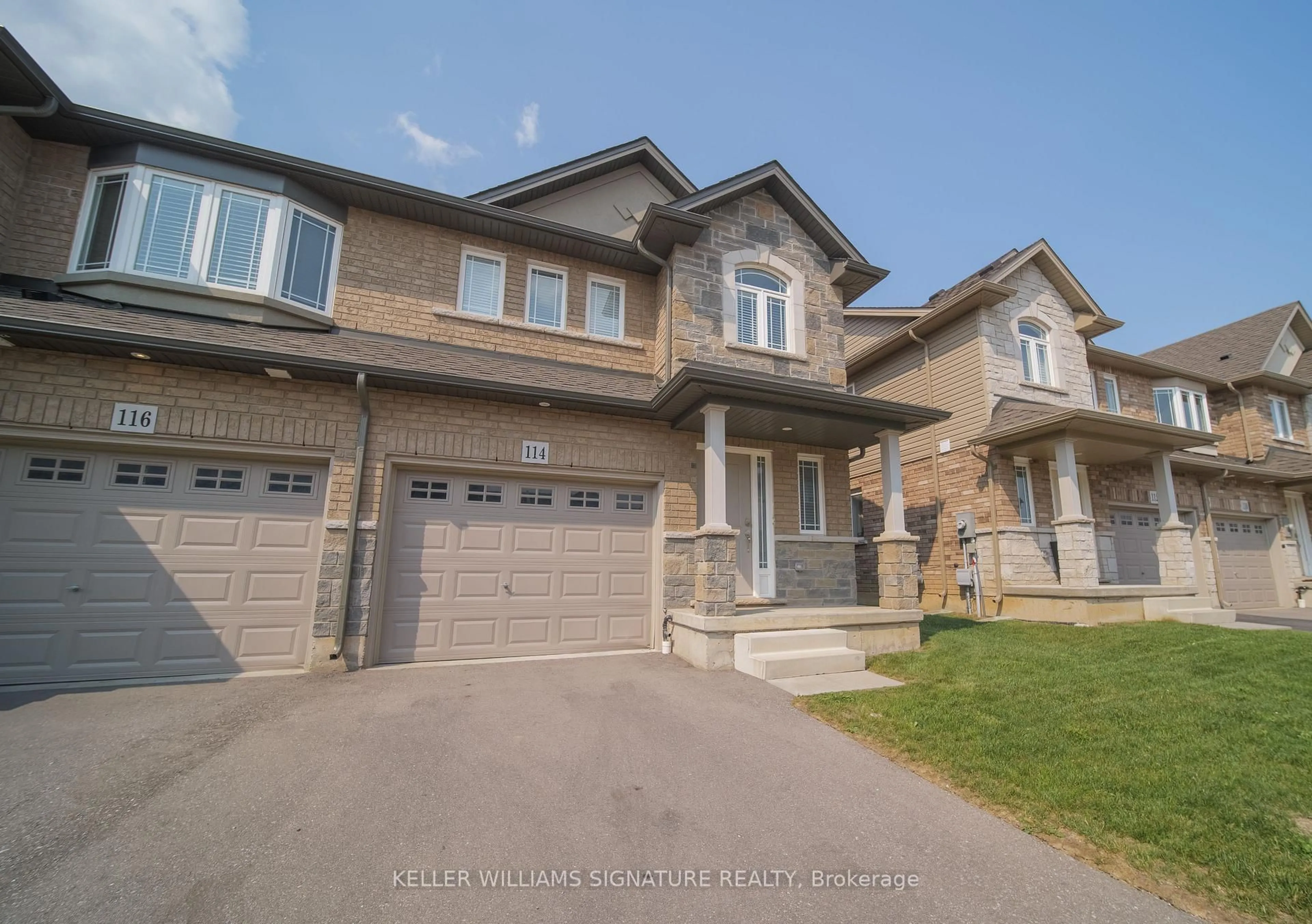 Home with brick exterior material, street for 114 Laguna Village Cres, Hamilton Ontario L0R 1P0
