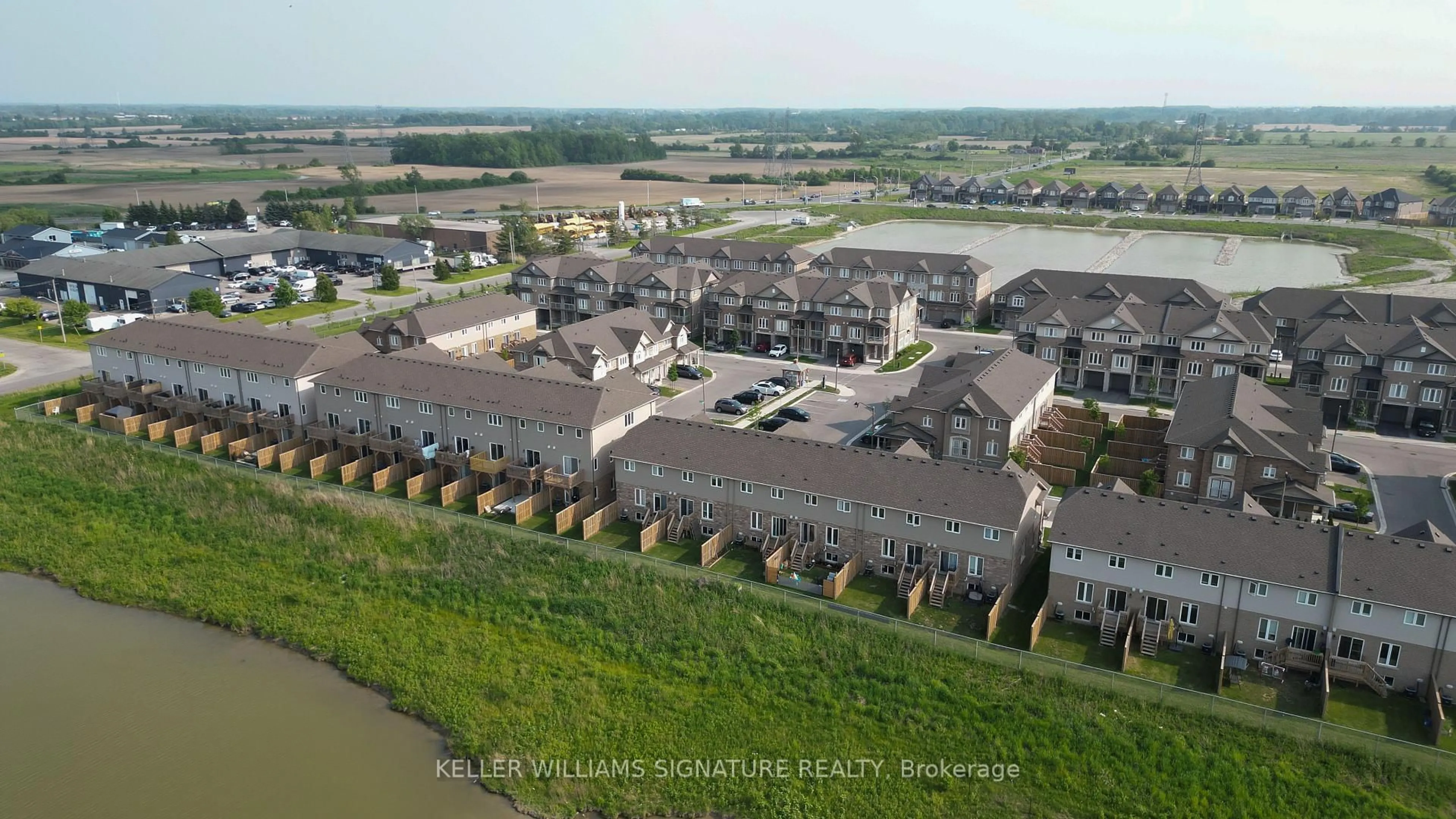 A pic from outside/outdoor area/front of a property/back of a property/a pic from drone, water/lake/river/ocean view for 114 Laguna Village Cres, Hamilton Ontario L0R 1P0