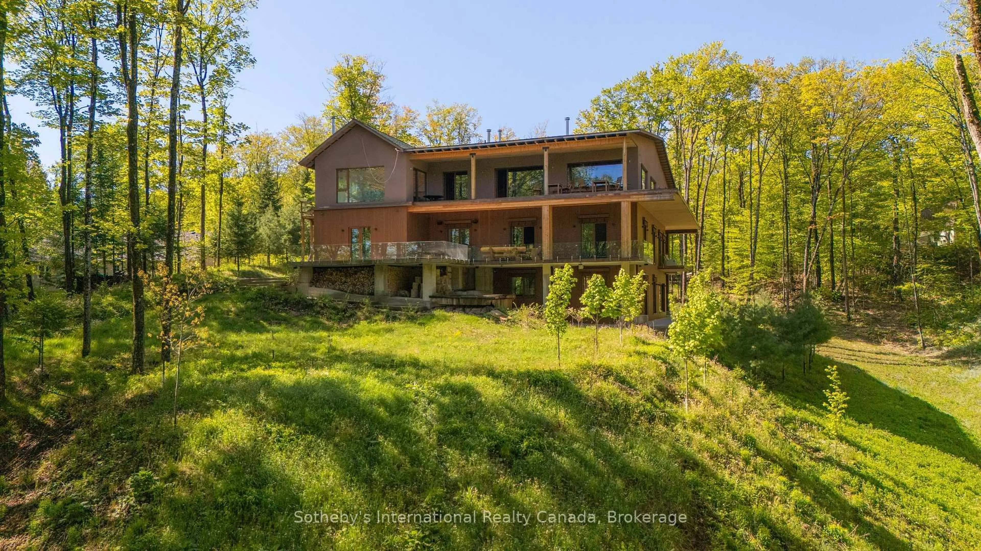 A pic from outside/outdoor area/front of a property/back of a property/a pic from drone, water/lake/river/ocean view for 1739 Trapper's Trail Rd, Dysart et al Ontario K0M 1S0