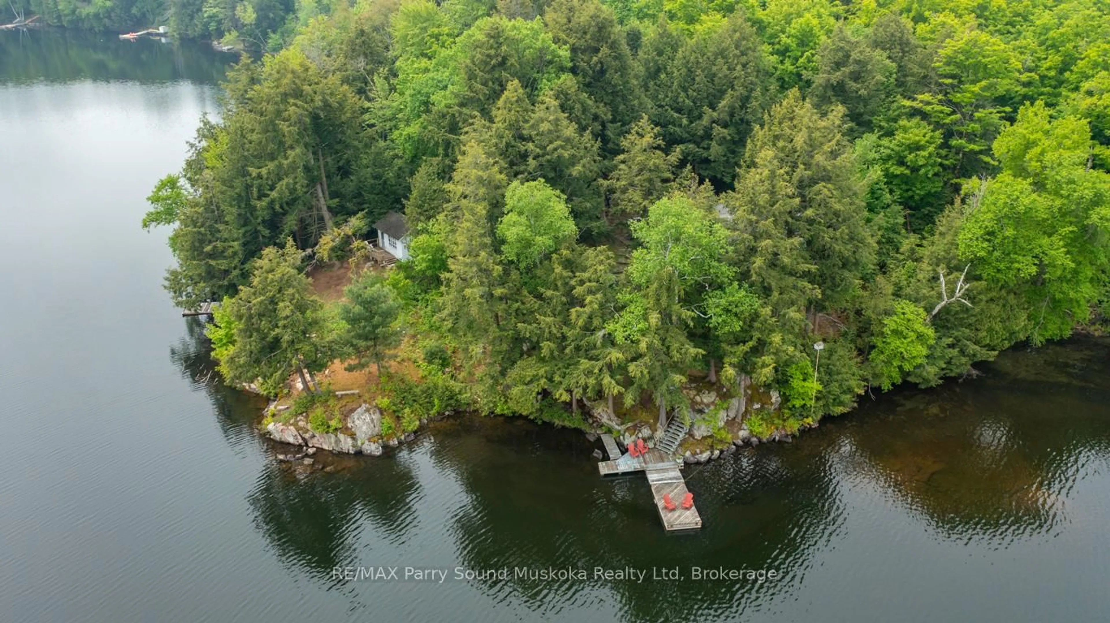 A pic from outside/outdoor area/front of a property/back of a property/a pic from drone, water/lake/river/ocean view for 91 Haystead Bay Rd, Seguin Ontario P2A 0B2