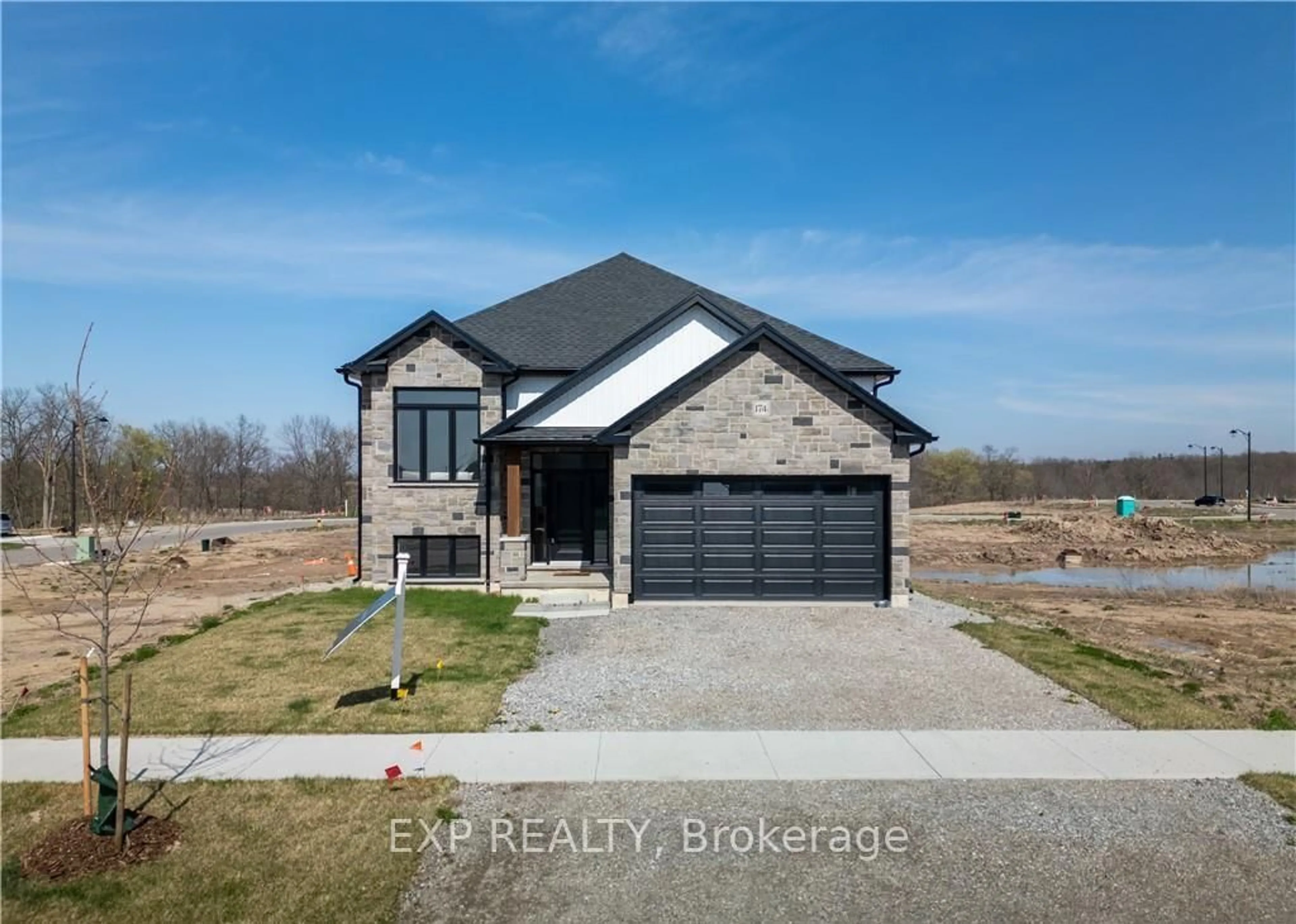 Home with brick exterior material, unknown for 174 PIKE CREEK Dr, Haldimand Ontario N0A 1E0