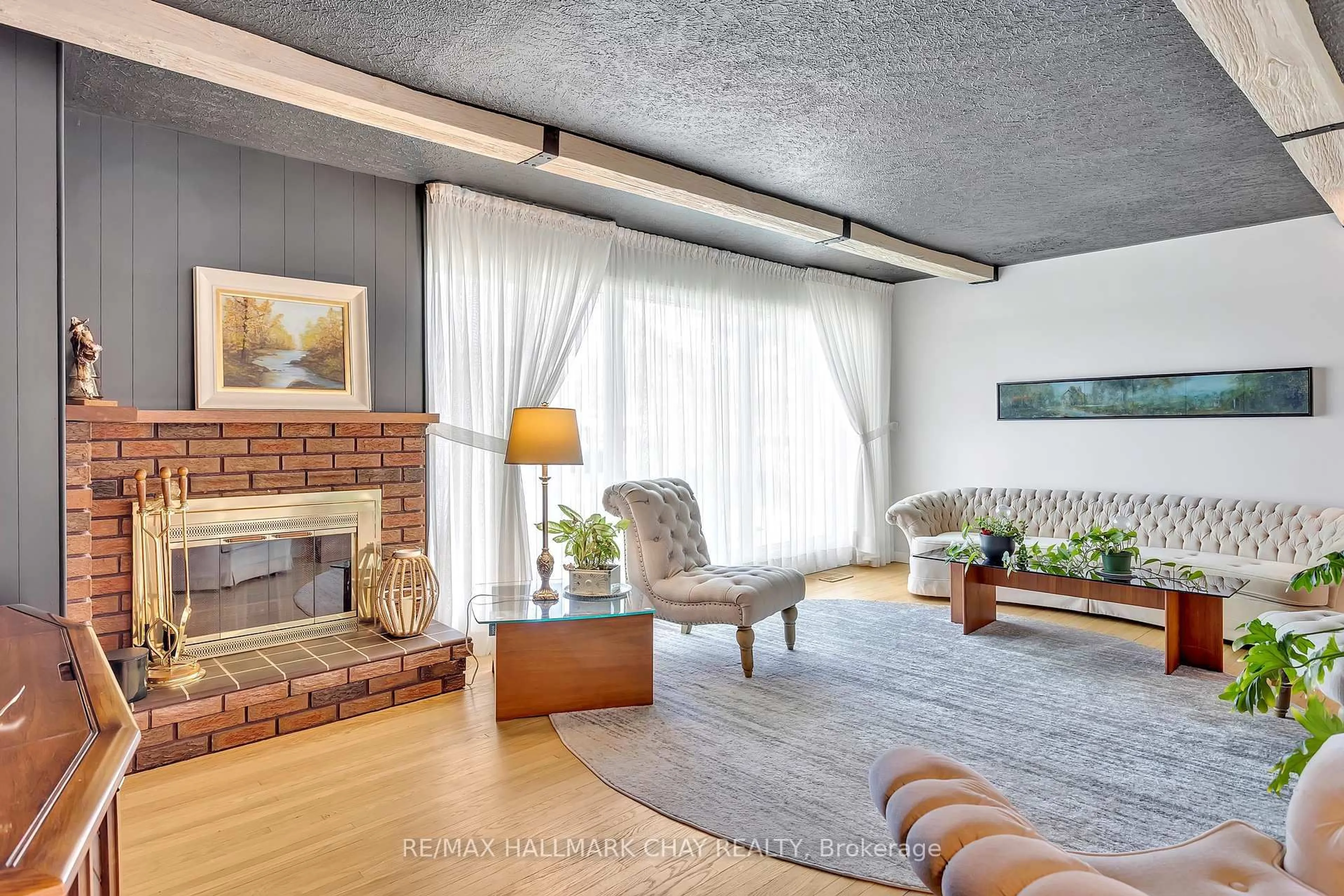 Living room with furniture, cement floor for 1009 FAIRBAIRN St, Peterborough North Ontario K9K 1C1