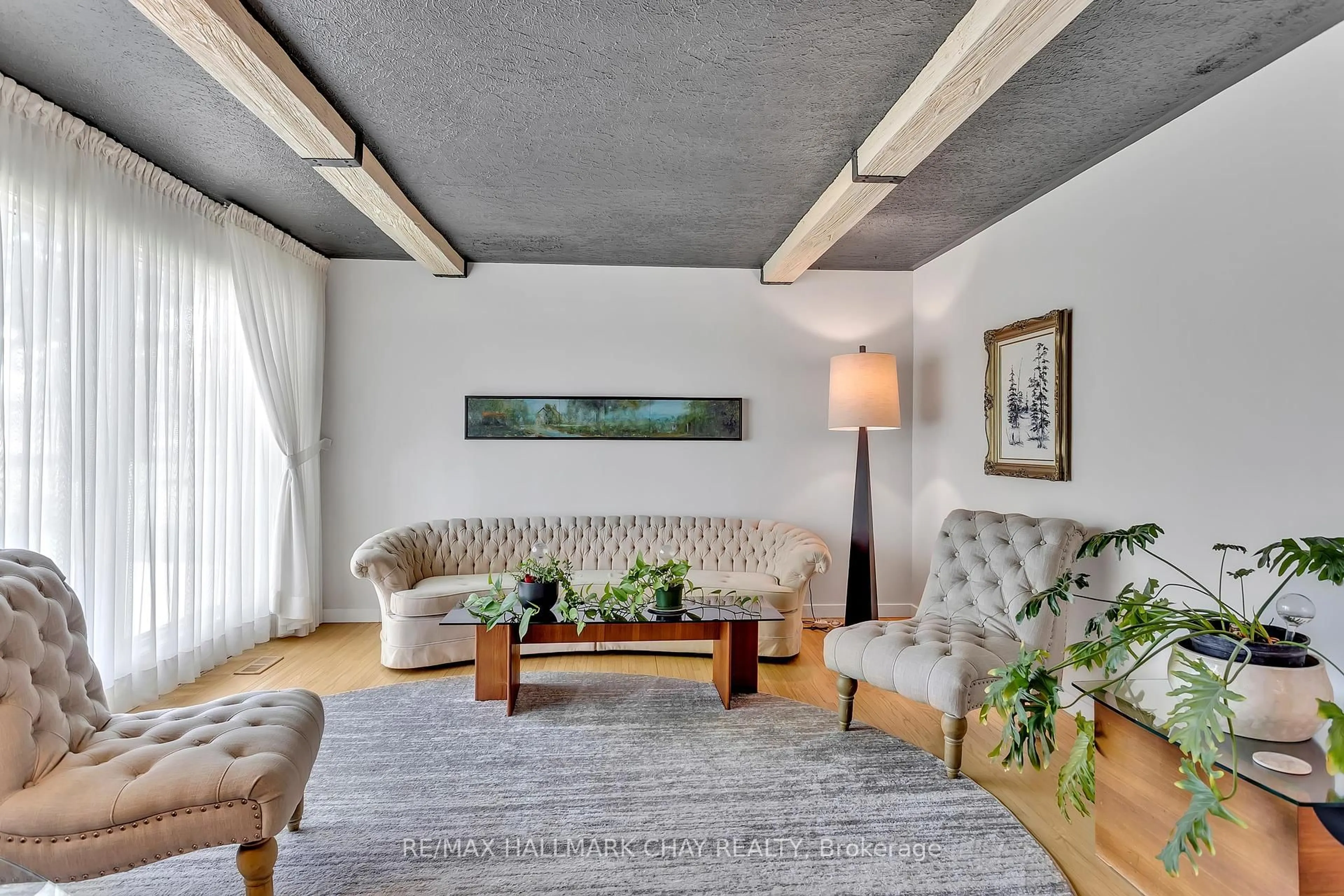 Living room with furniture, cement floor for 1009 FAIRBAIRN St, Peterborough North Ontario K9K 1C1