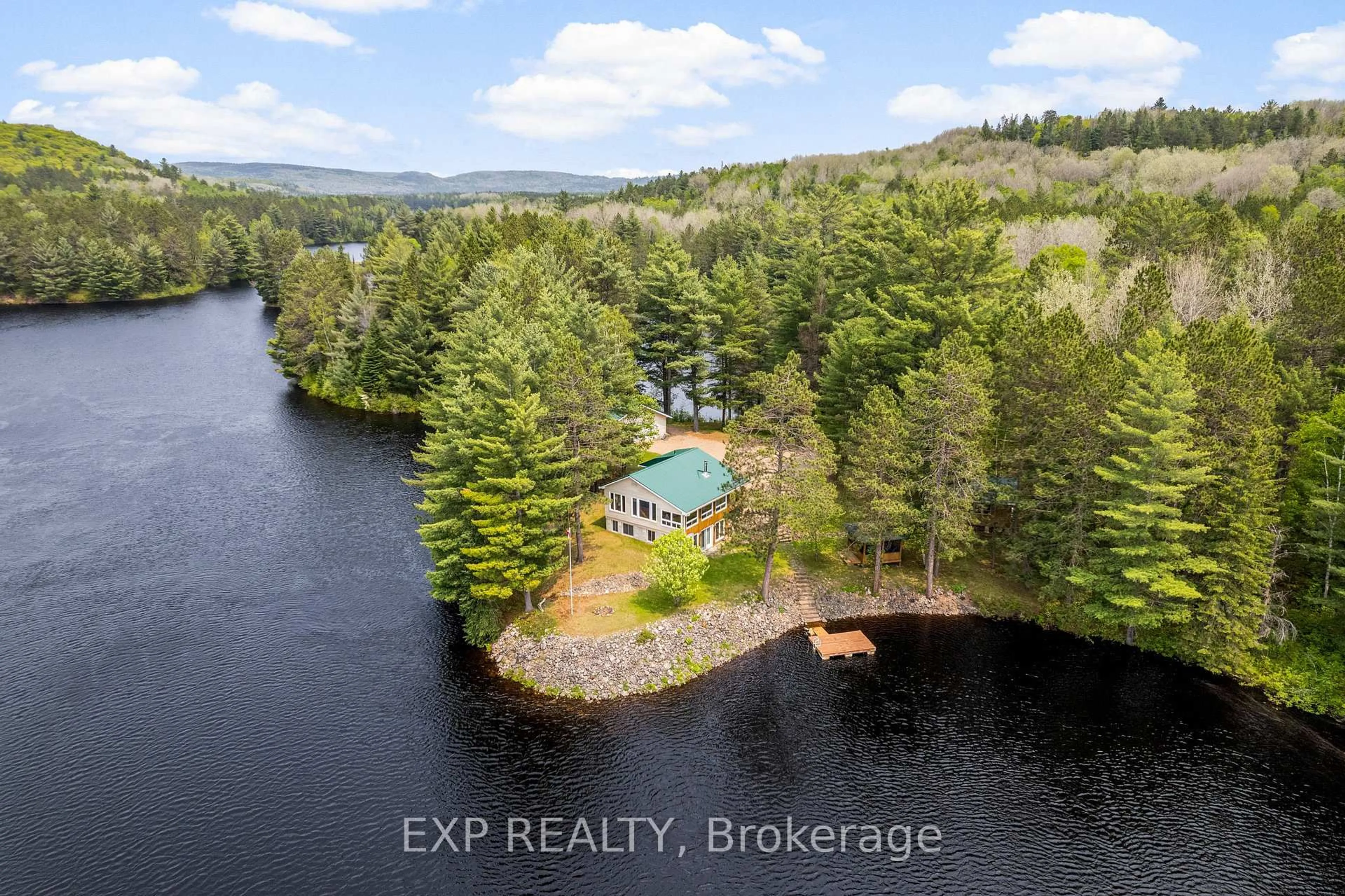 A pic from outside/outdoor area/front of a property/back of a property/a pic from drone, water/lake/river/ocean view for 1601A Major Lake Rd, South Algonquin Ontario K0J 2M0