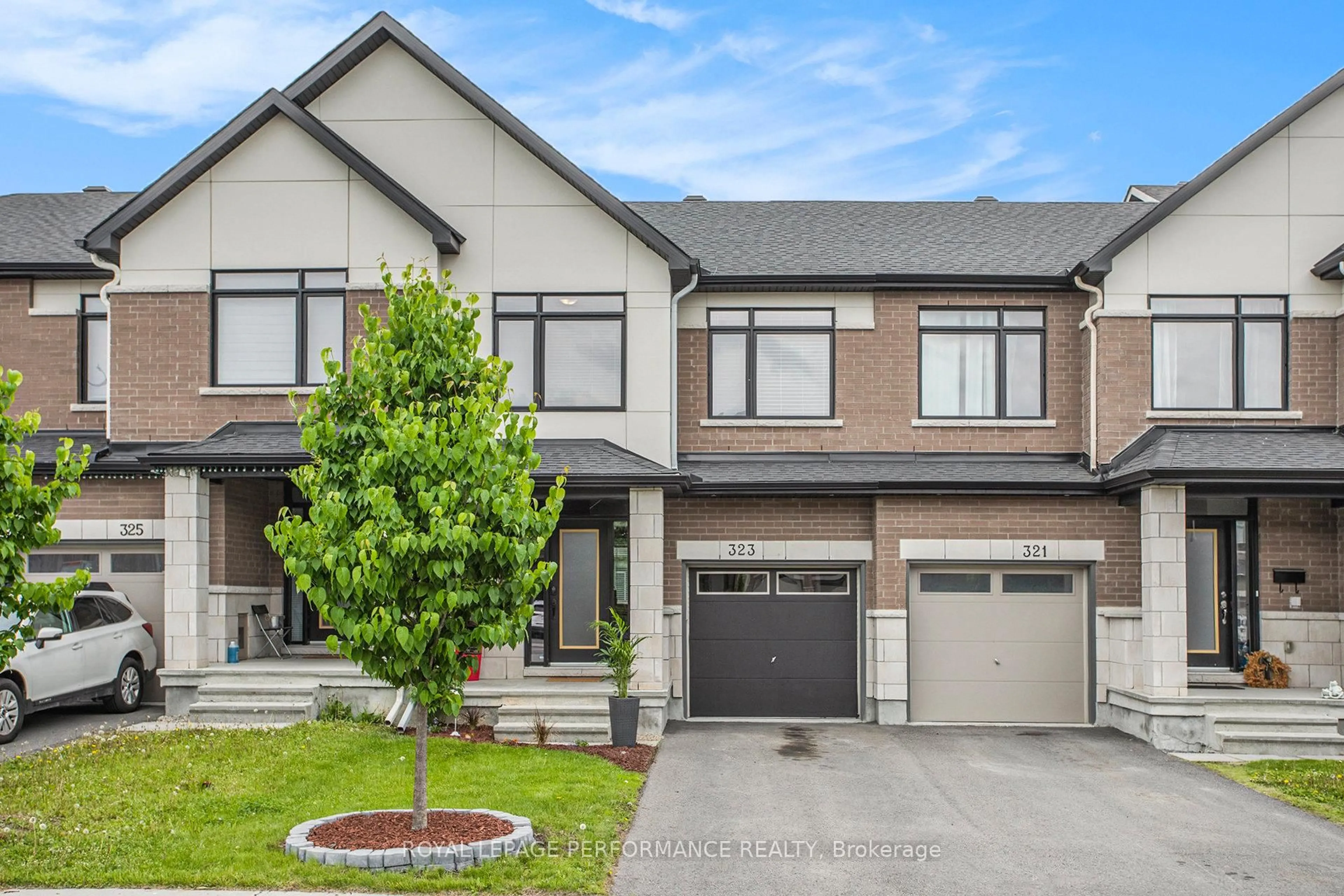 Home with brick exterior material, street for 323 JOSHUA St, Ottawa Ontario K1W 0N8