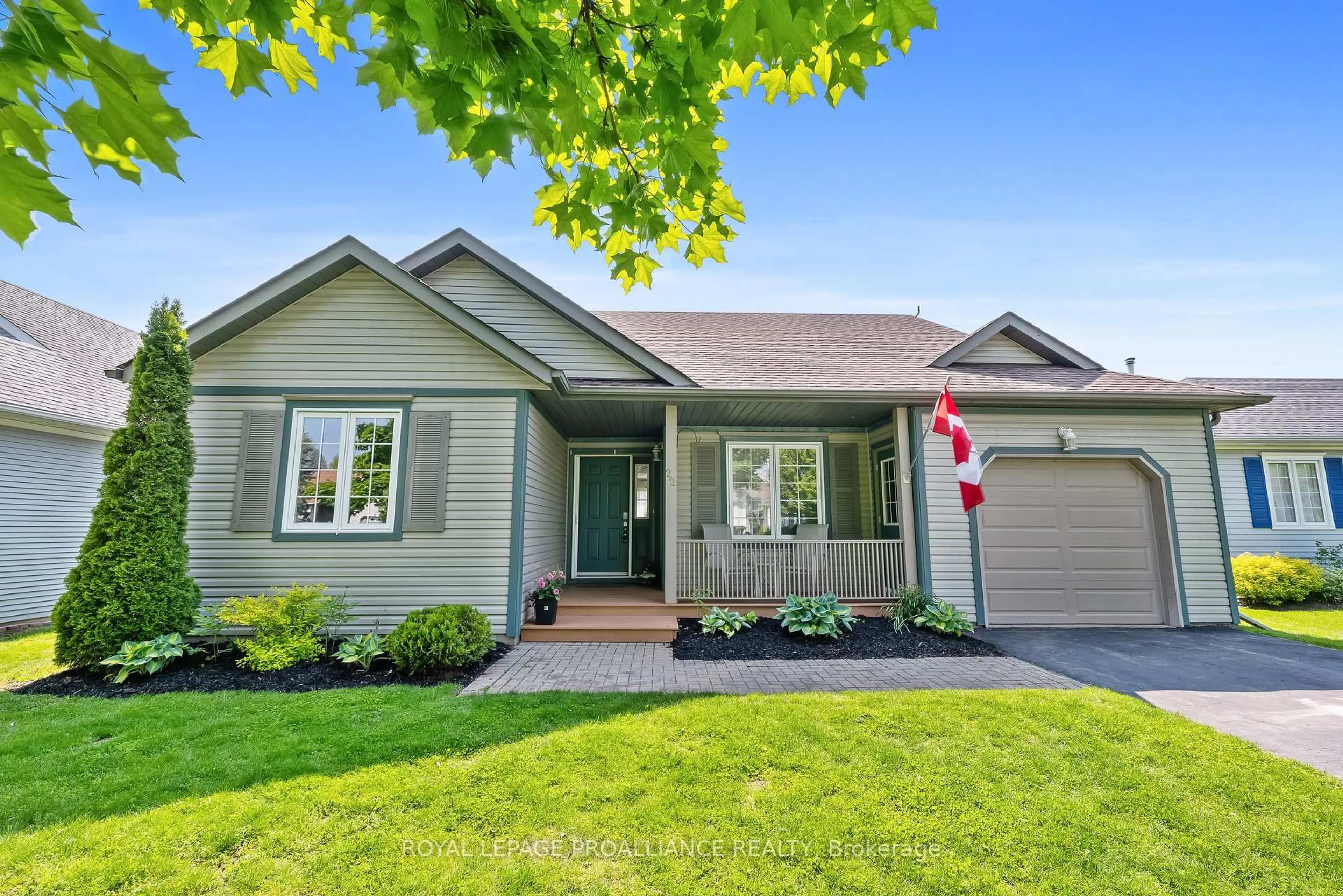 Home with vinyl exterior material, street for 22 Mills Rd, Brighton Ontario K0K 1H0