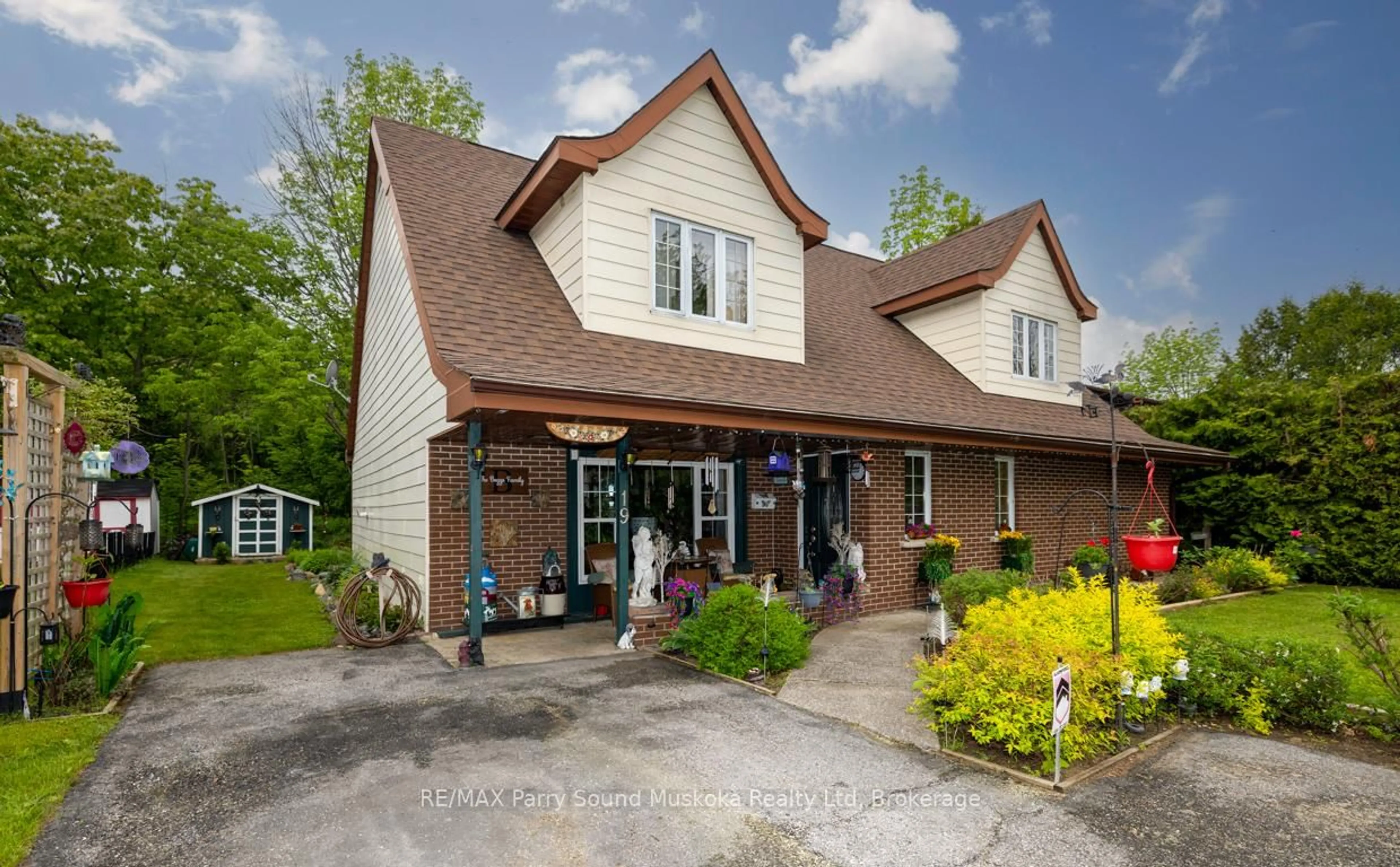 A pic from outside/outdoor area/front of a property/back of a property/a pic from drone, street for 19 Macklaim Dr, Parry Sound Ontario P2A 2Z7