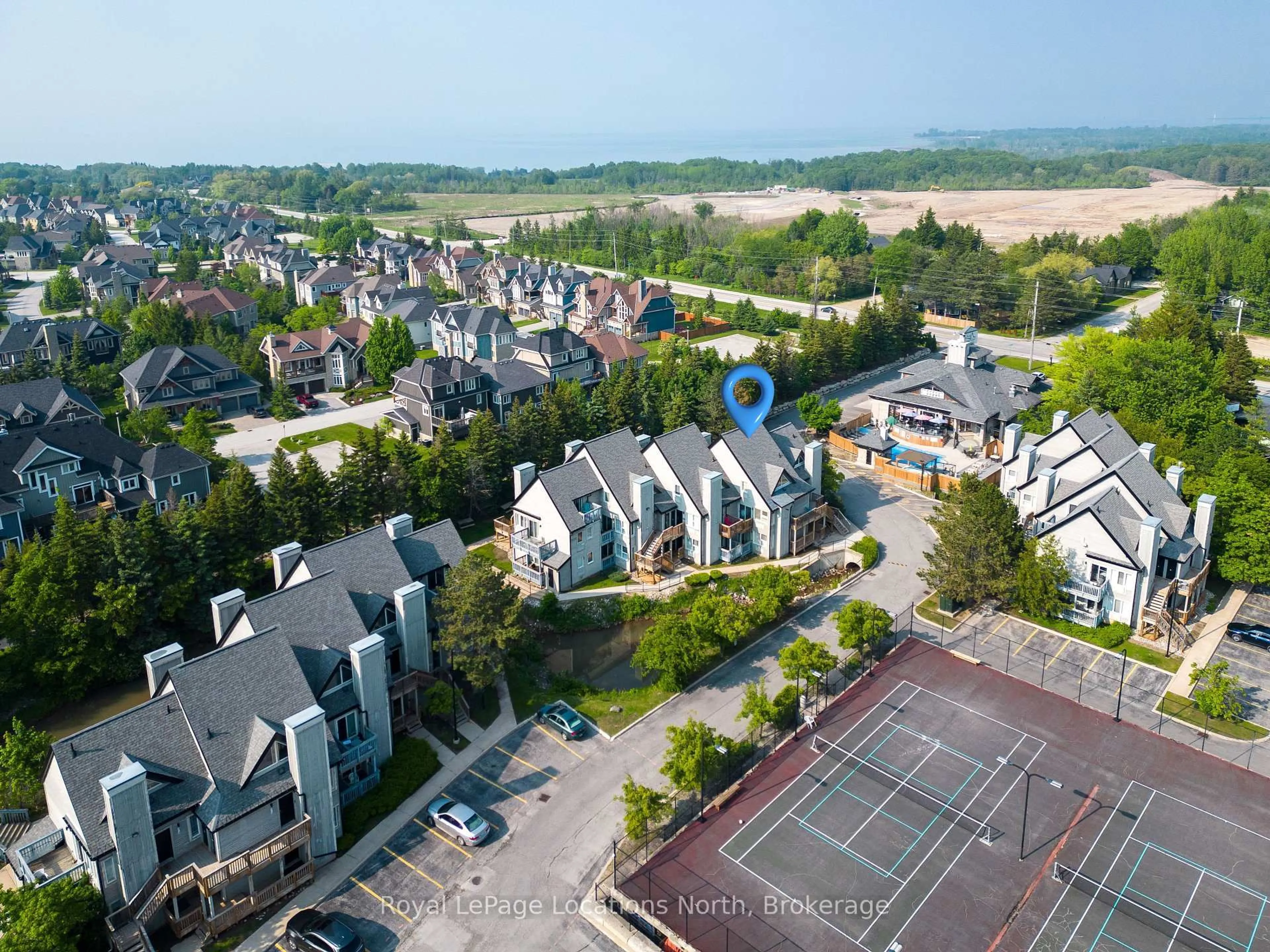 A pic from outside/outdoor area/front of a property/back of a property/a pic from drone, city buildings view from balcony for 796468 Grey 19 Rd #116, Blue Mountains Ontario L9Y 0N6