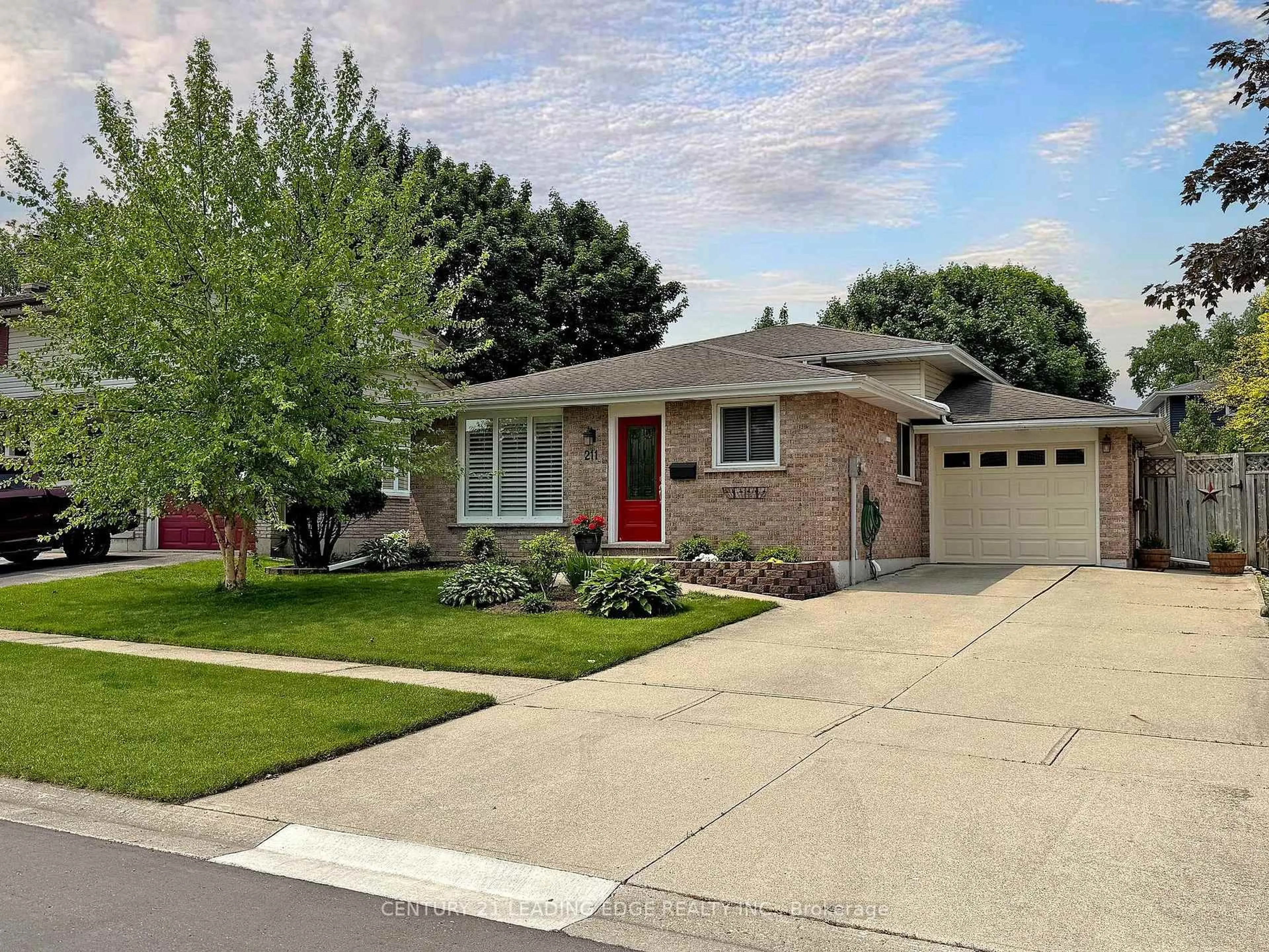 Home with brick exterior material, street for 211 DIEFENBAKER Dr, Woodstock Ontario N4S 8K1