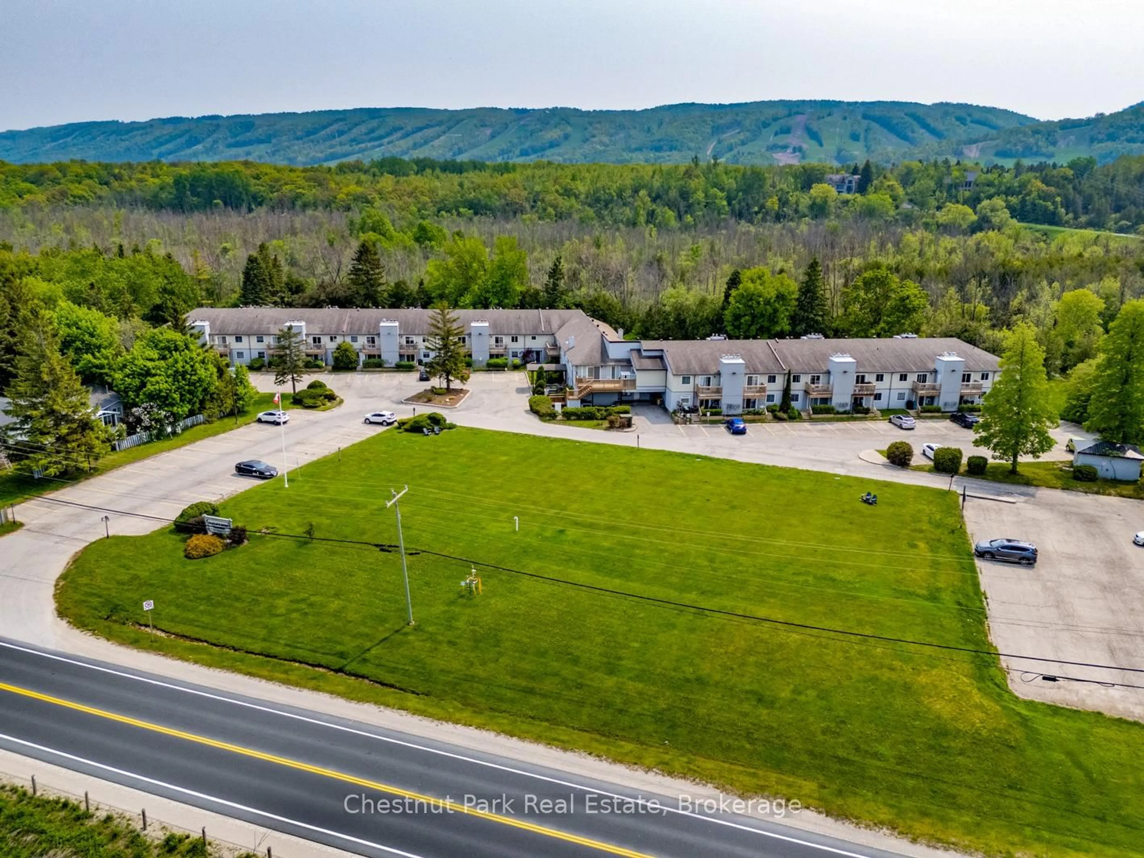 A pic from outside/outdoor area/front of a property/back of a property/a pic from drone, mountain view for 209472 Highway 26 #39, Blue Mountains Ontario L9Y 0V3