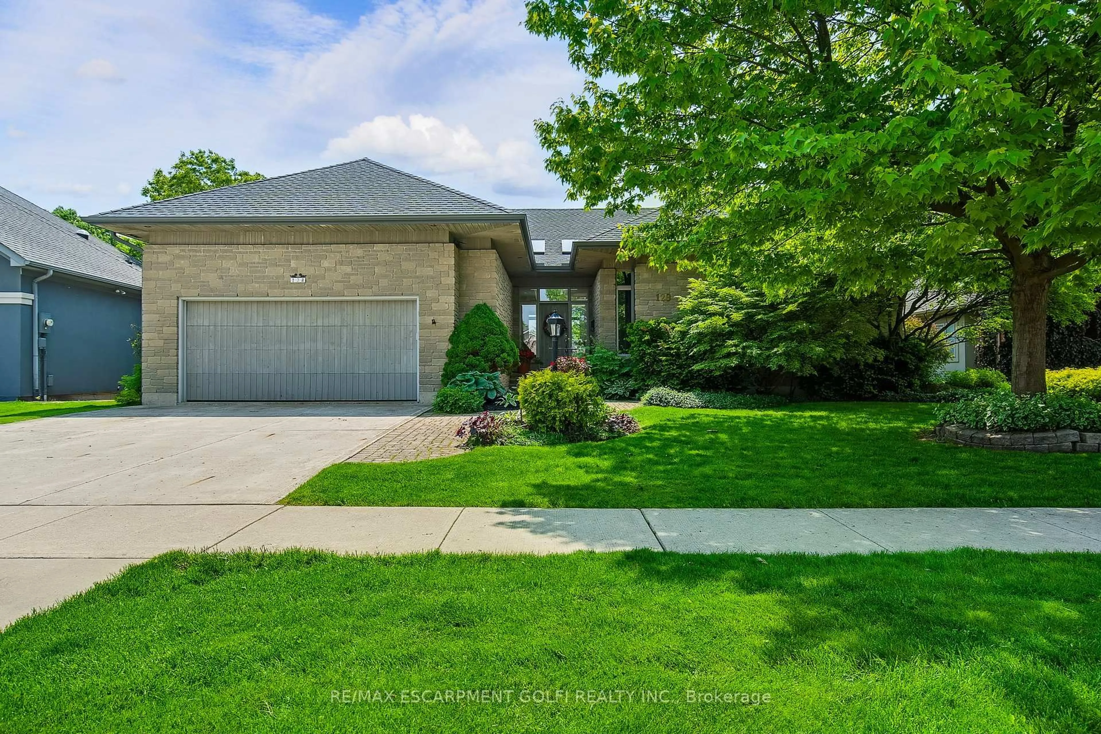 Home with brick exterior material, street for 128 Grindstone Way, Hamilton Ontario L9H 7B8