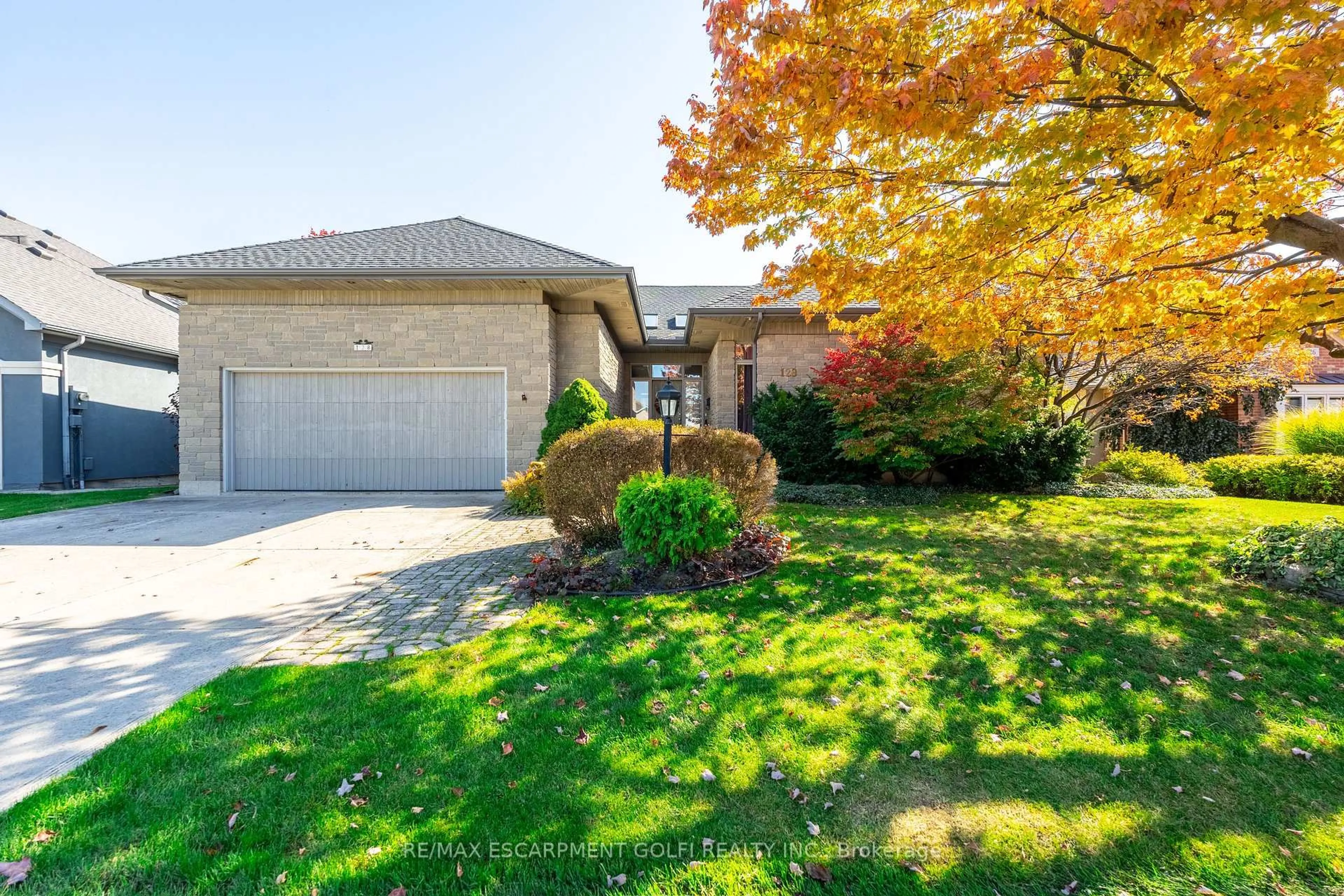 Home with brick exterior material, street for 128 Grindstone Way, Hamilton Ontario L9H 7B8
