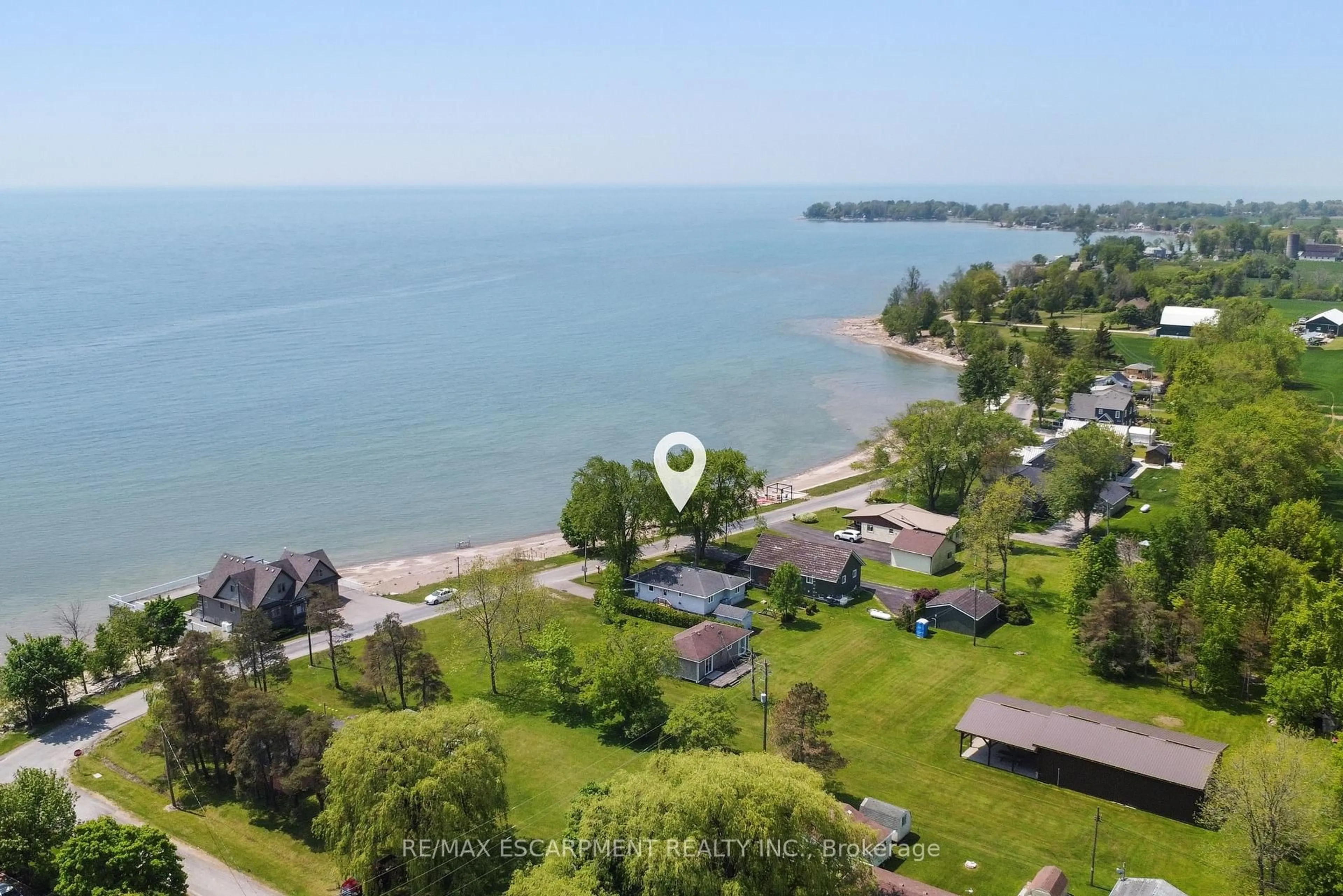 A pic from outside/outdoor area/front of a property/back of a property/a pic from drone, water/lake/river/ocean view for 1351 LAKESHORE Rd, Haldimand Ontario N0A 1P0